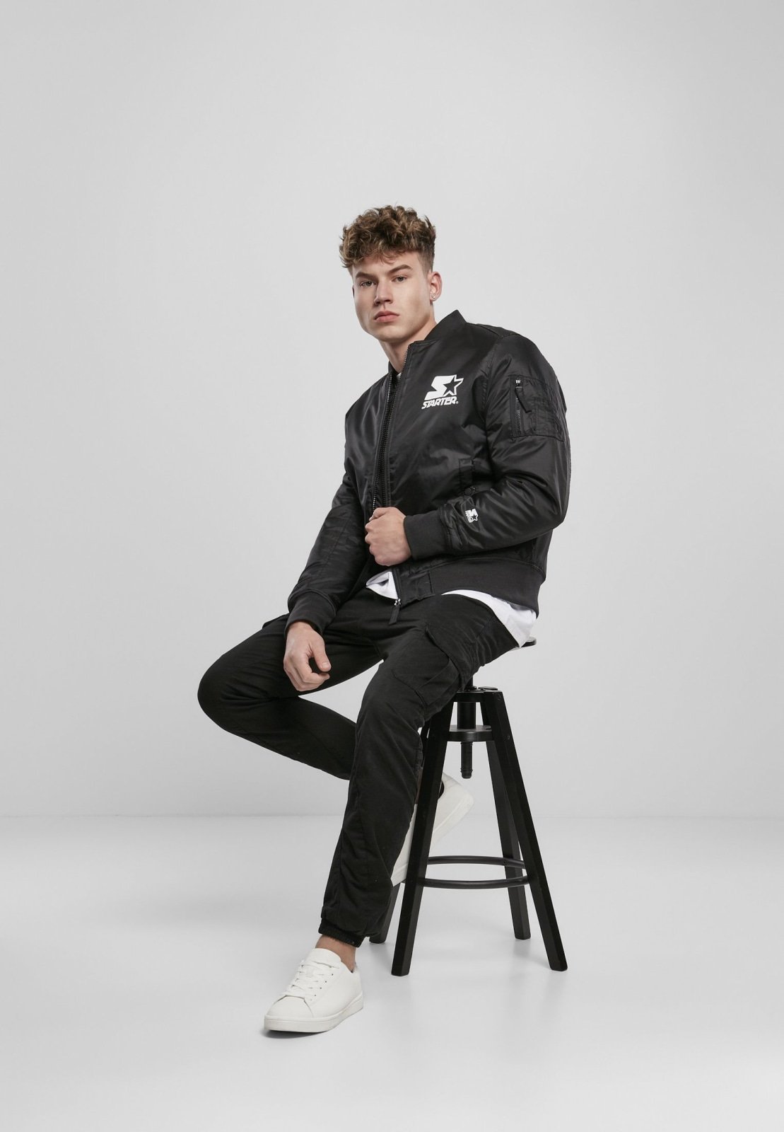 Classic Logo Bomber Jacket featuring a stand-up collar, padding, and zipper, with Starter logo branding on the chest and cuffs.