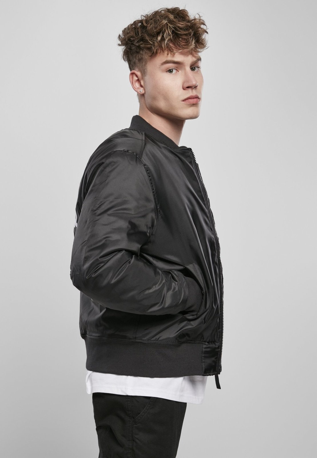 Classic Logo Bomber Jacket featuring a stand-up collar, padding, and zipper, with Starter logo branding on the chest and cuffs.