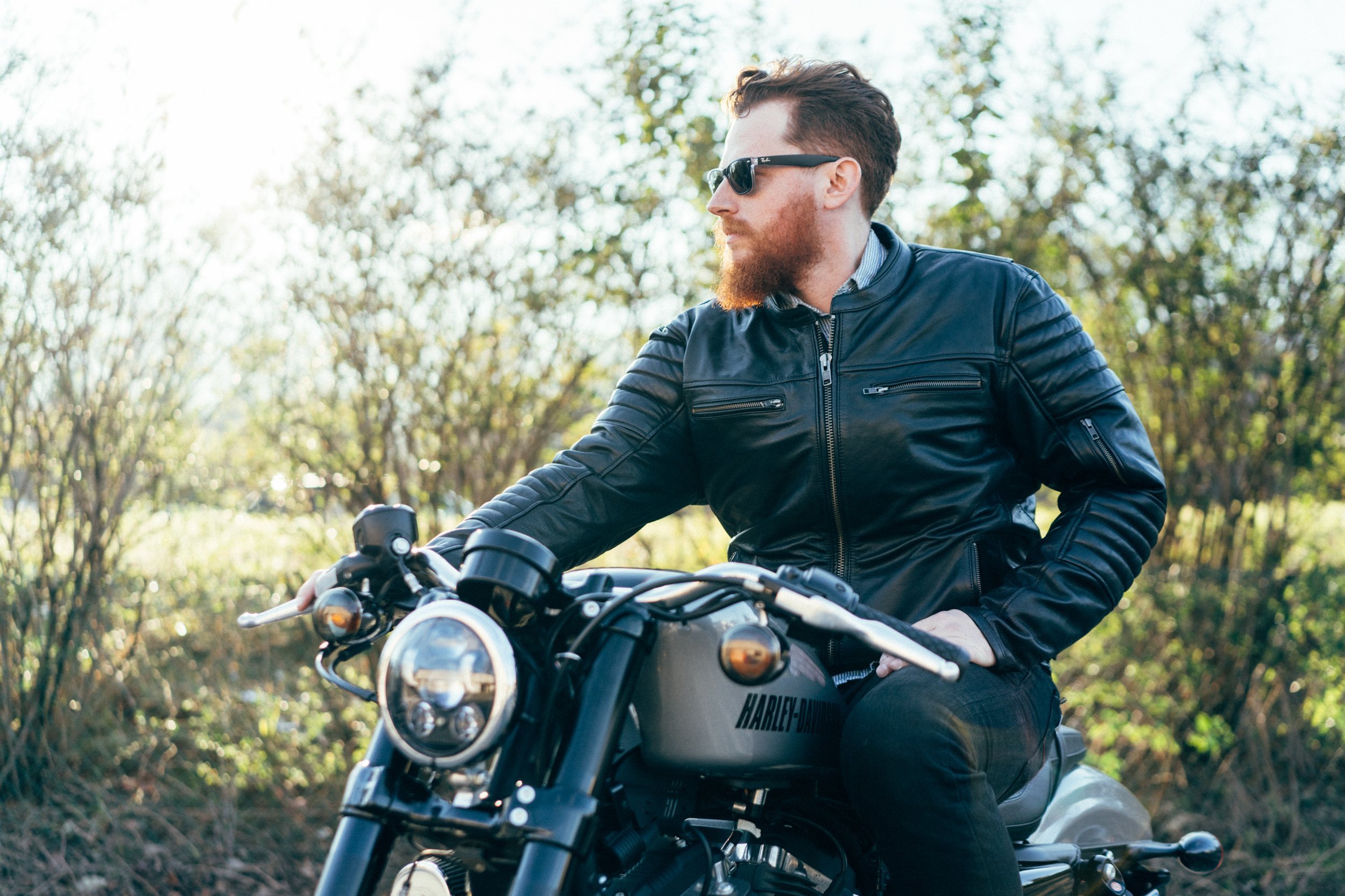 Commuter Men's Motorcycle Leather Jacket in black, featuring vintage naked cowhide, padded shoulders, and multiple pockets.