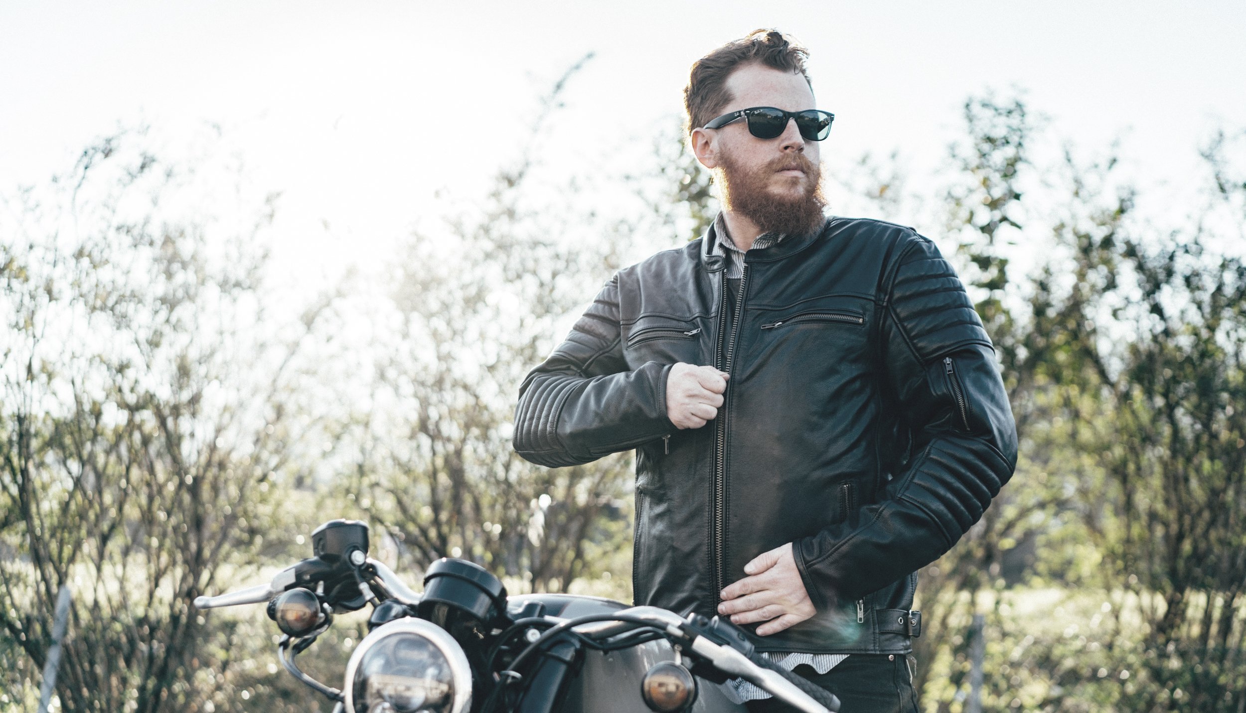 Commuter Men's Motorcycle Leather Jacket in black, featuring vintage naked cowhide, padded shoulders, and multiple pockets.