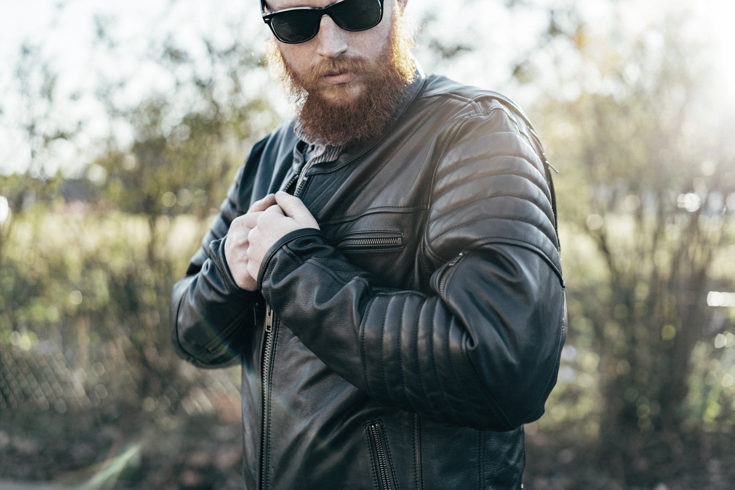 Commuter Men's Motorcycle Leather Jacket in black, featuring vintage naked cowhide, padded shoulders, and multiple pockets.