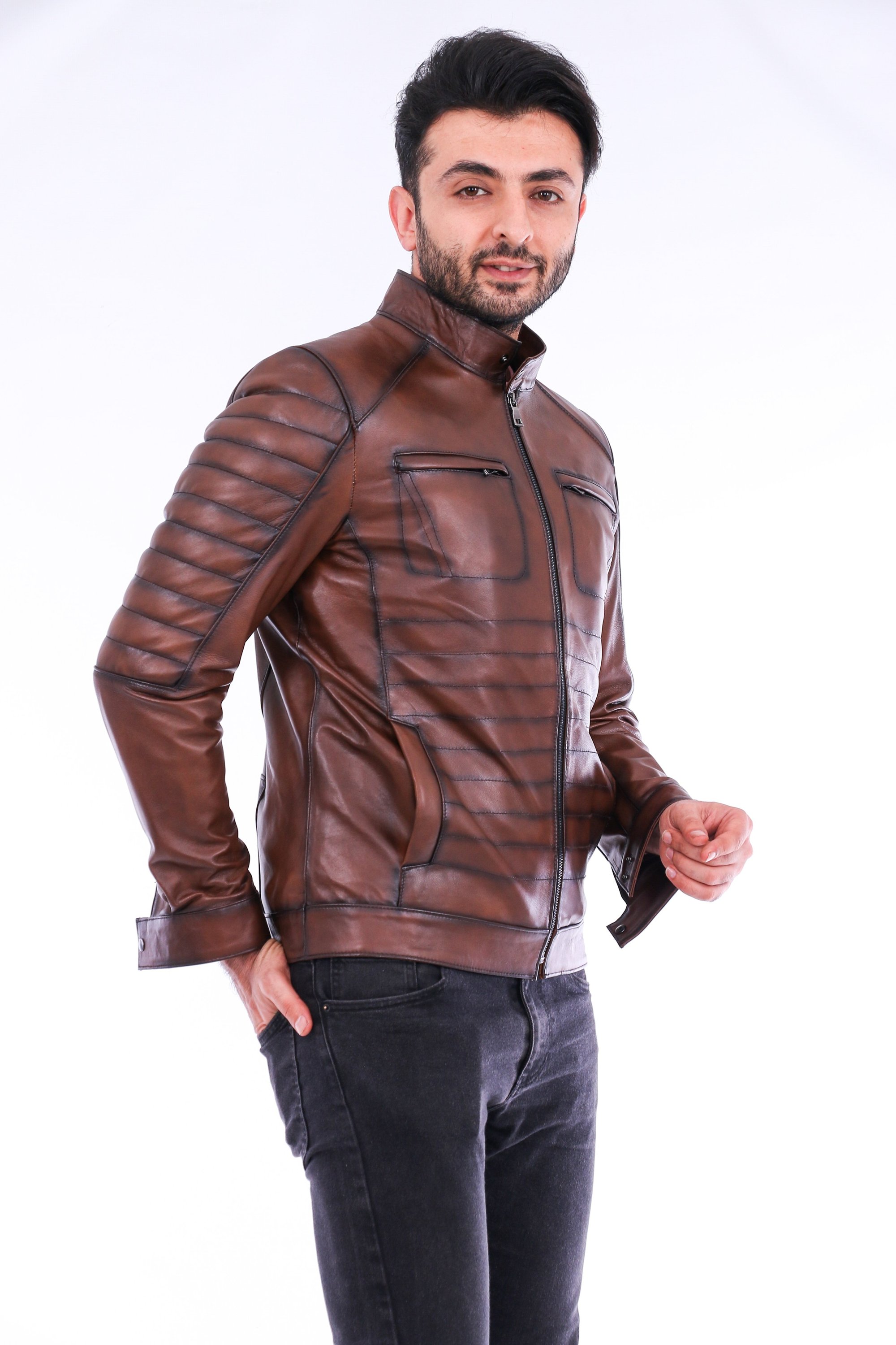 Daniel Biker Leather Jacket made from genuine lambskin, featuring a sleek design with a band collar and zipper closure in rich brown color.