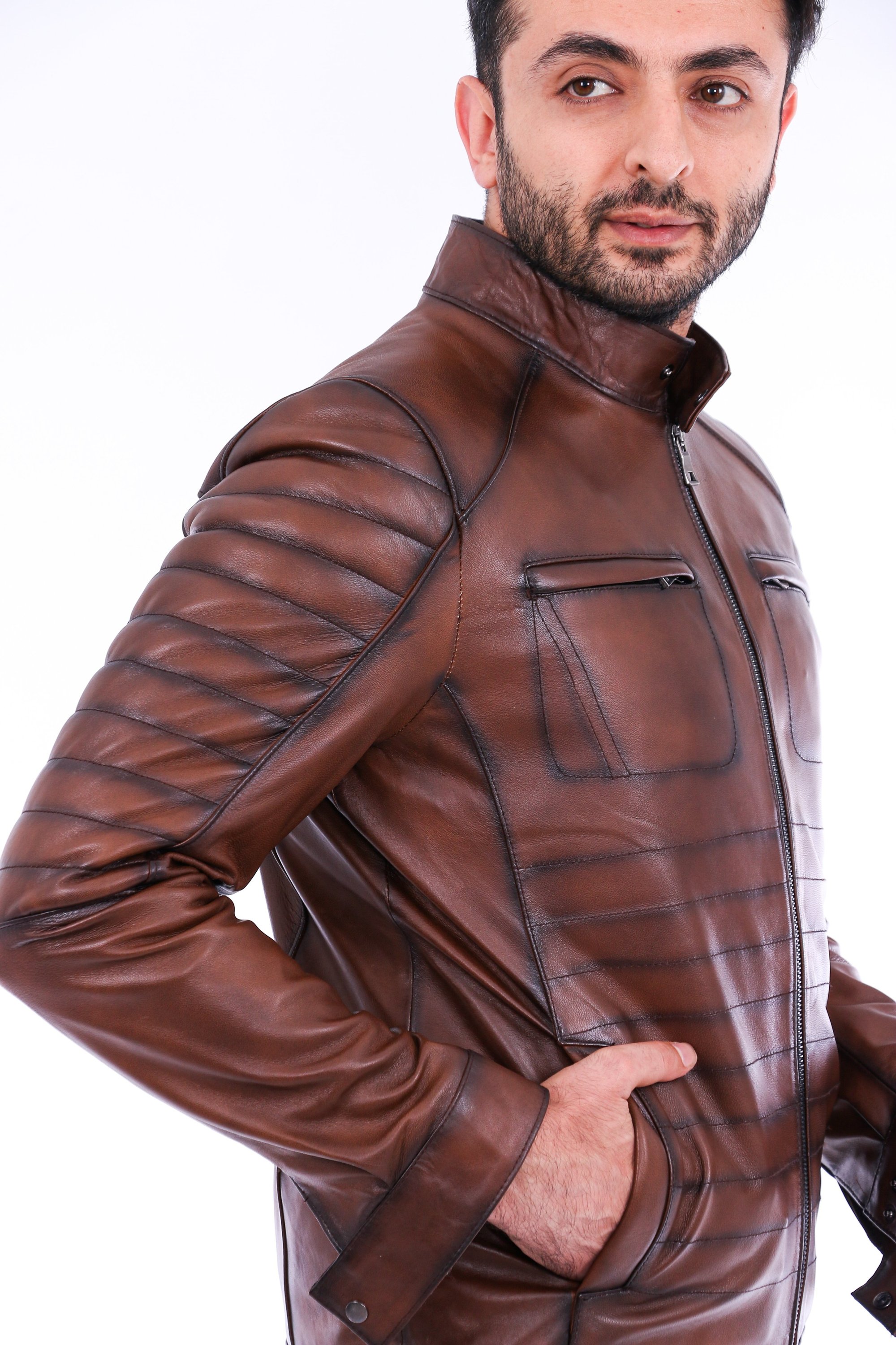 Daniel Biker Leather Jacket made from genuine lambskin, featuring a sleek design with a band collar and zipper closure in rich brown color.