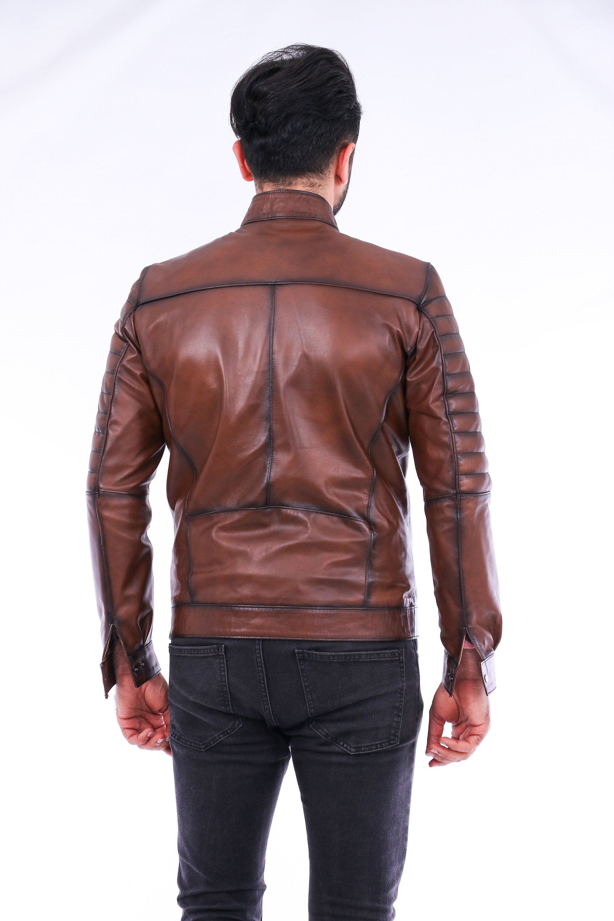 Daniel Biker Leather Jacket made from genuine lambskin, featuring a sleek design with a band collar and zipper closure in rich brown color.