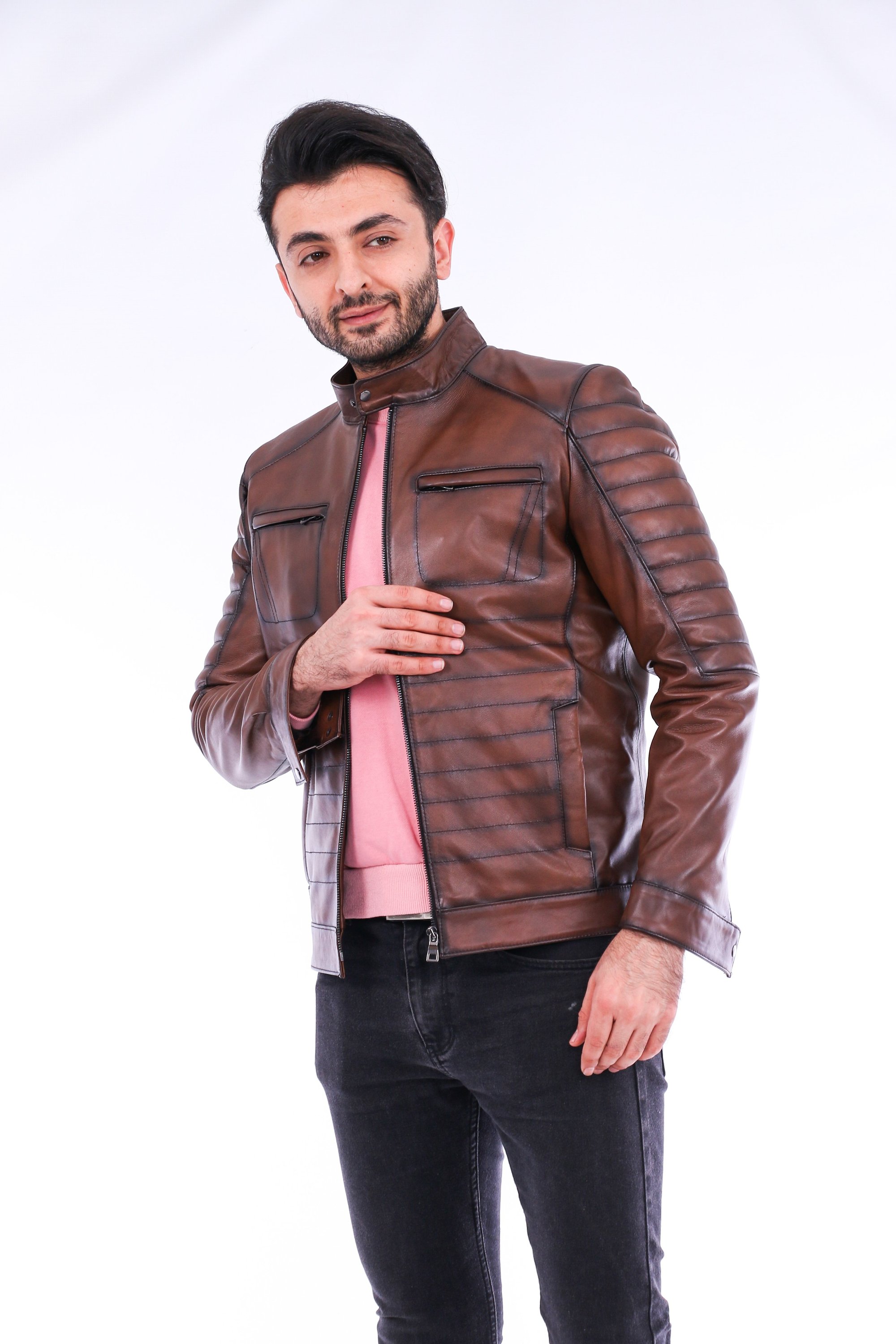 Daniel Biker Leather Jacket made from genuine lambskin, featuring a sleek design with a band collar and zipper closure in rich brown color.