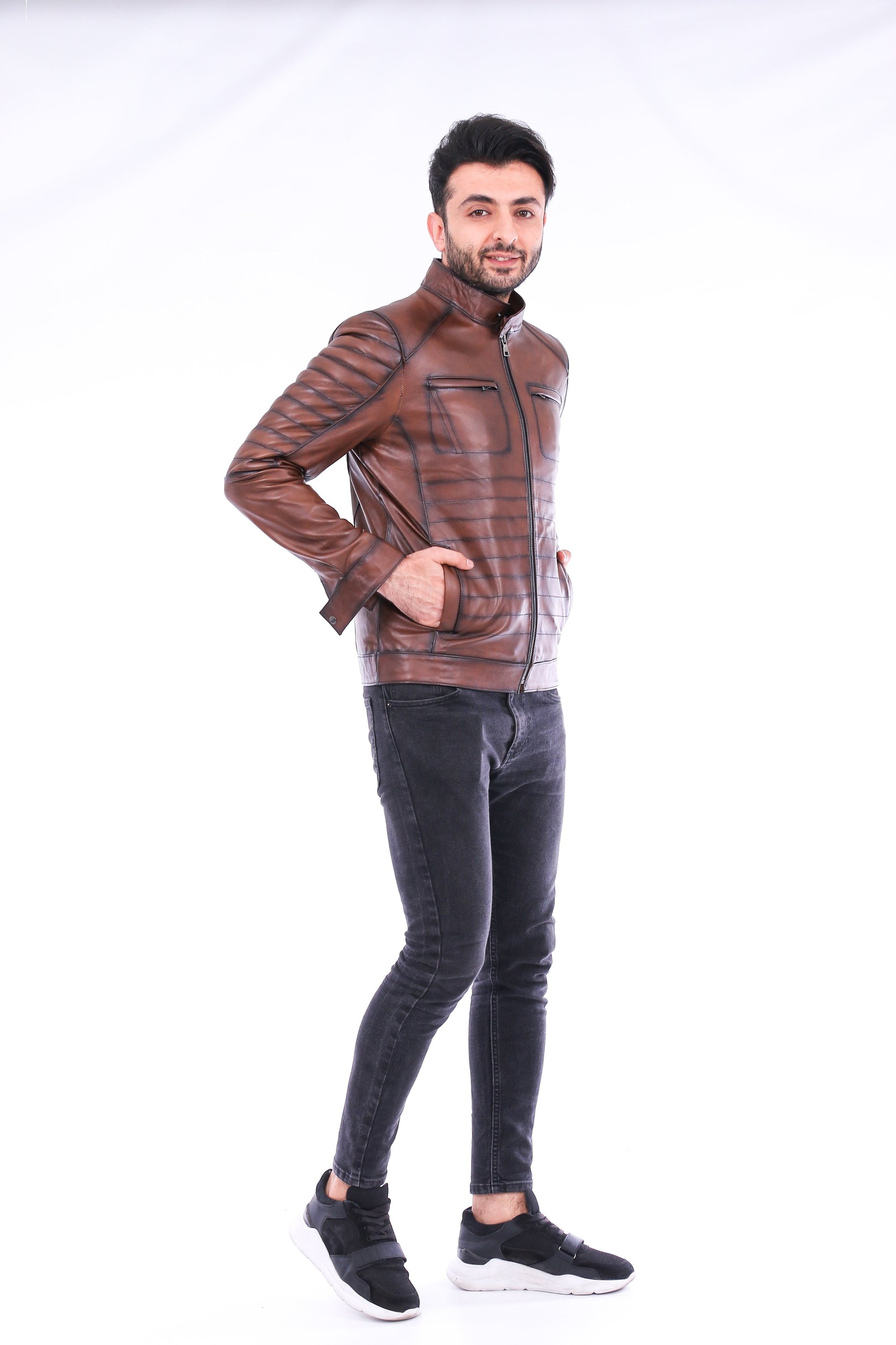 Daniel Biker Leather Jacket made from genuine lambskin, featuring a sleek design with a band collar and zipper closure in rich brown color.