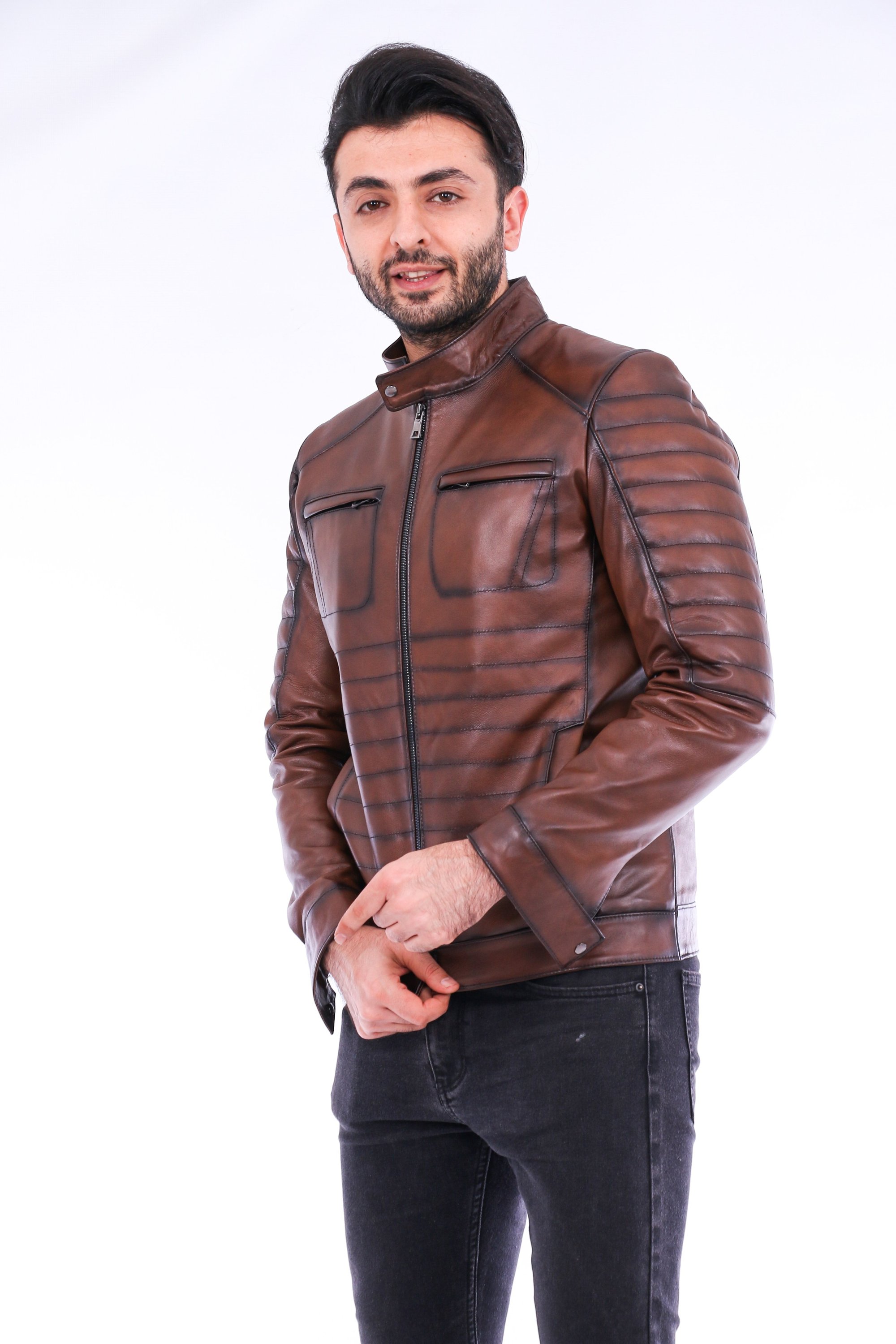 Daniel Biker Leather Jacket made from genuine lambskin, featuring a sleek design with a band collar and zipper closure in rich brown color.