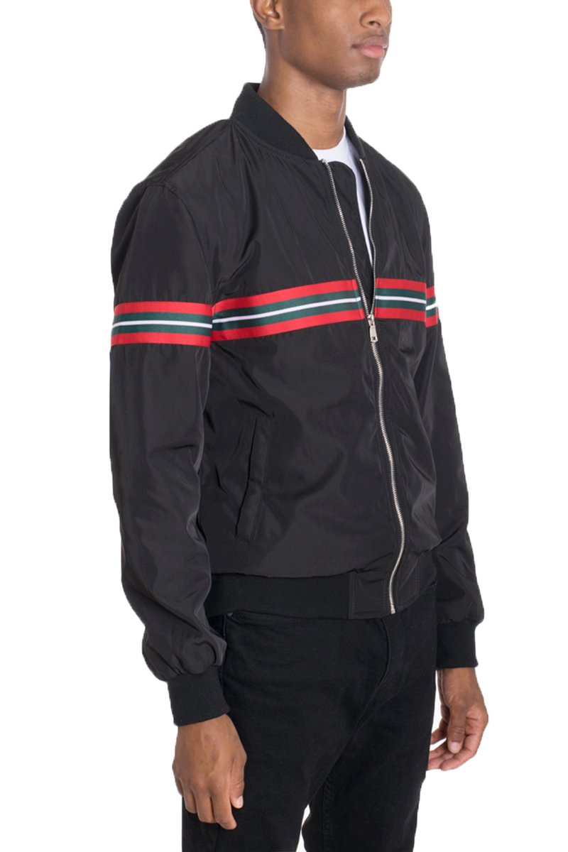 Dom Taped Bomber jacket displayed on a mannequin, featuring a regular fit, standard pockets, and a tug-free zipper closure.