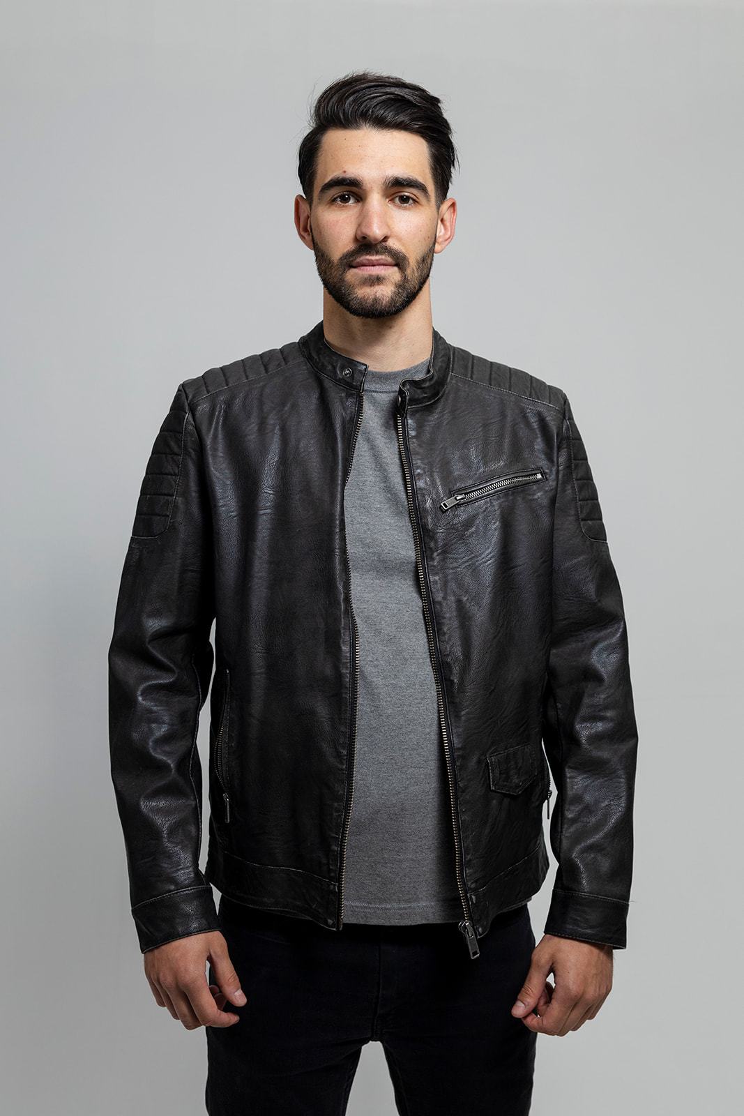 Ethan Men's Faux Leather Jacket in black, showcasing its stylish design and high-quality faux leather material.