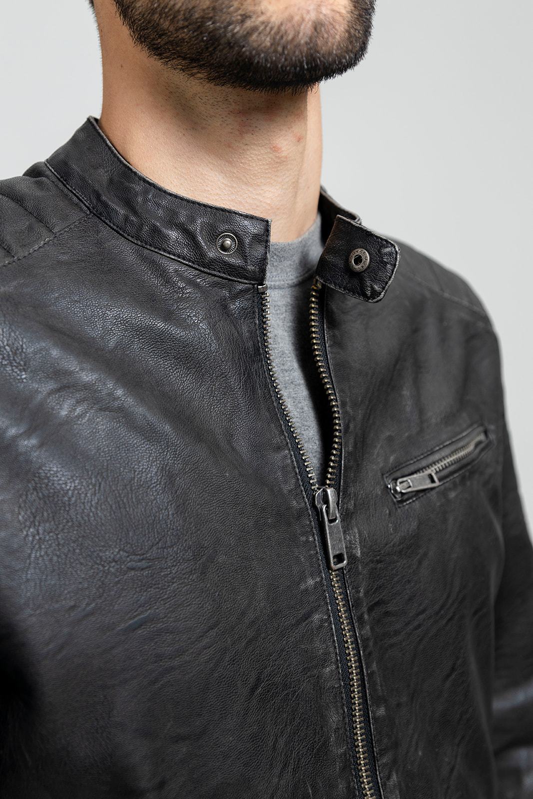 Ethan Men's Faux Leather Jacket in black, showcasing its stylish design and high-quality faux leather material.