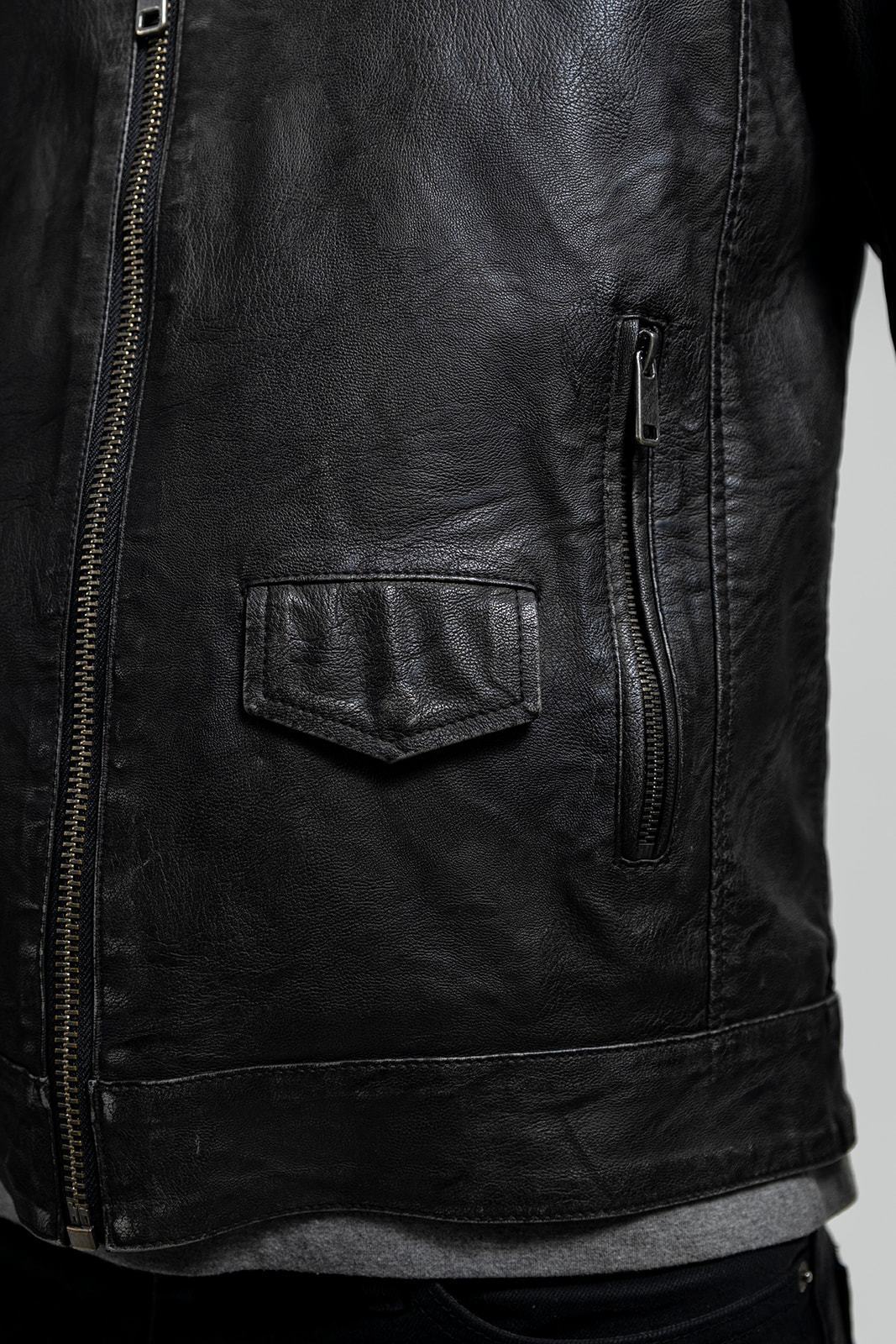 Ethan Men's Faux Leather Jacket in black, showcasing its stylish design and high-quality faux leather material.