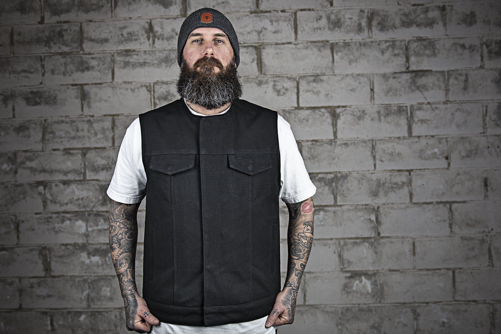 Fairfax Men's Motorcycle Canvas Vest featuring durable raw canvas, multiple pockets, and a classic club style design.