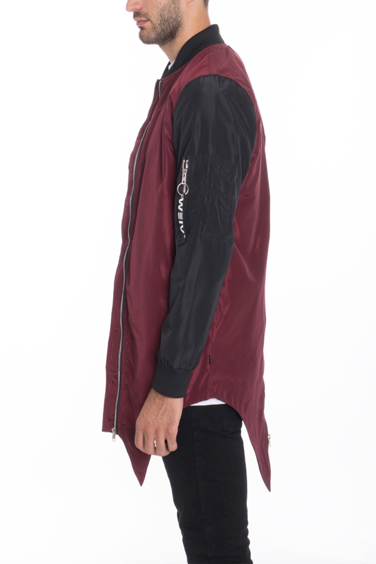 A stylish Fishtail Bomber jacket featuring an extended mid-slit tail, standard collar, and zipper, with side slant pockets and an inner chest pocket.