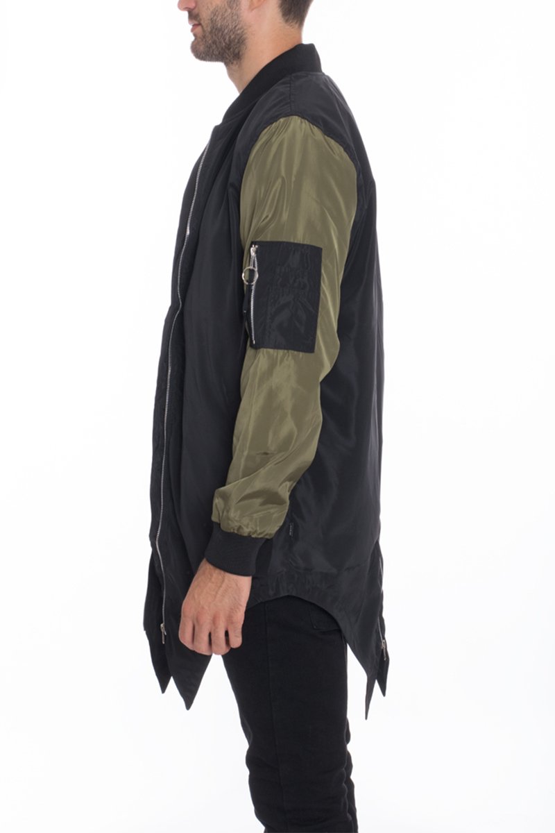 A lightweight Fishtail Bomber windbreaker jacket featuring an extended mid-slit tail, full zip closure, and multiple pockets, displayed on a model.