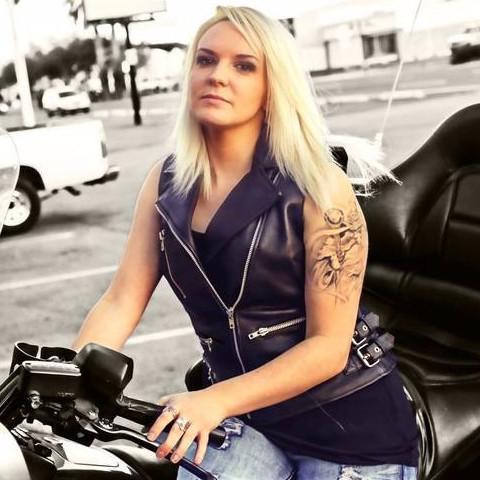 Goddess Women's Motorcycle Leather Vest featuring soft naked cowhide leather, stylish zippers, and a sleek design.