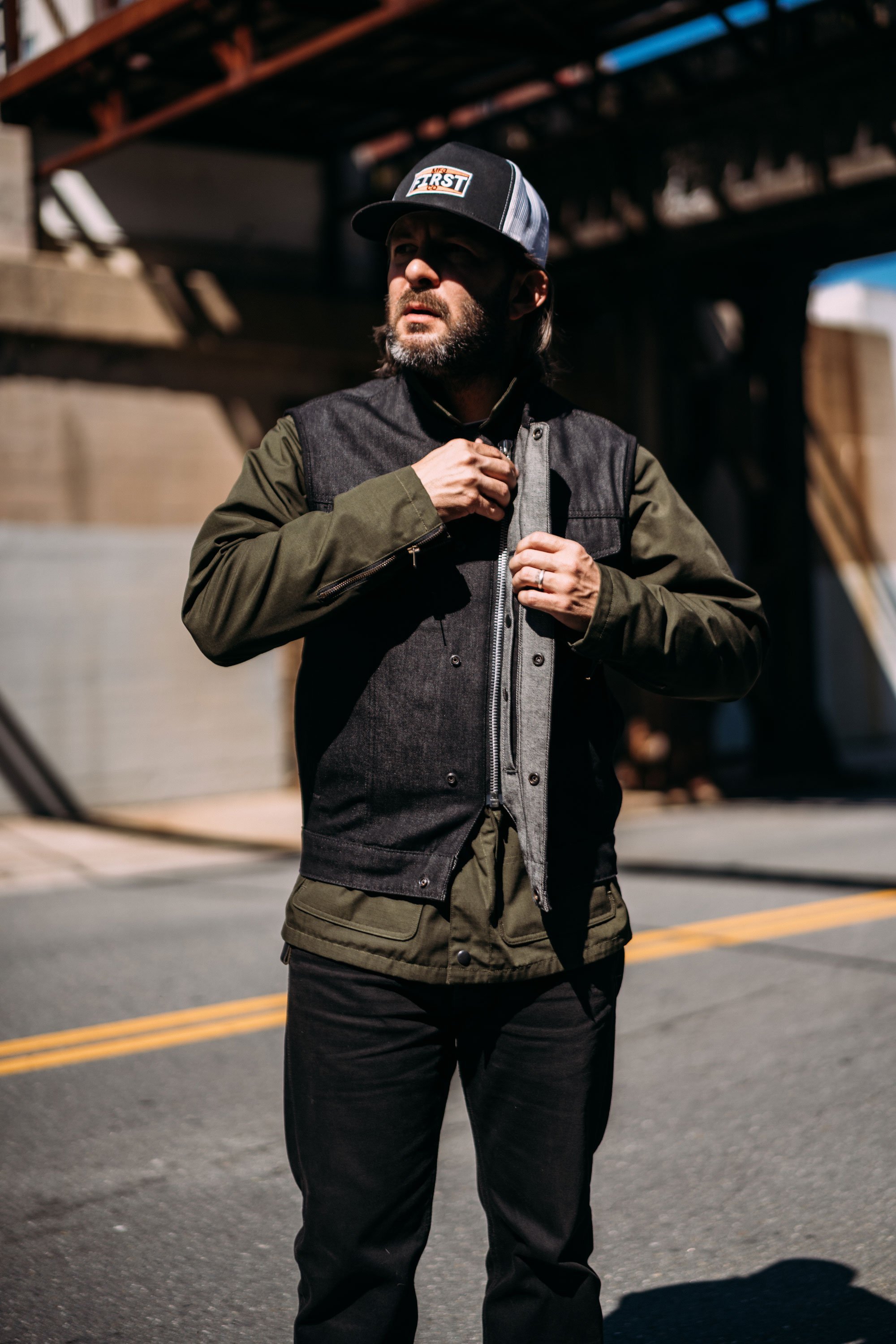 Haywood Black Denim Men's Motorcycle Vest featuring rough neck denim, multiple pockets, and a stylish design.