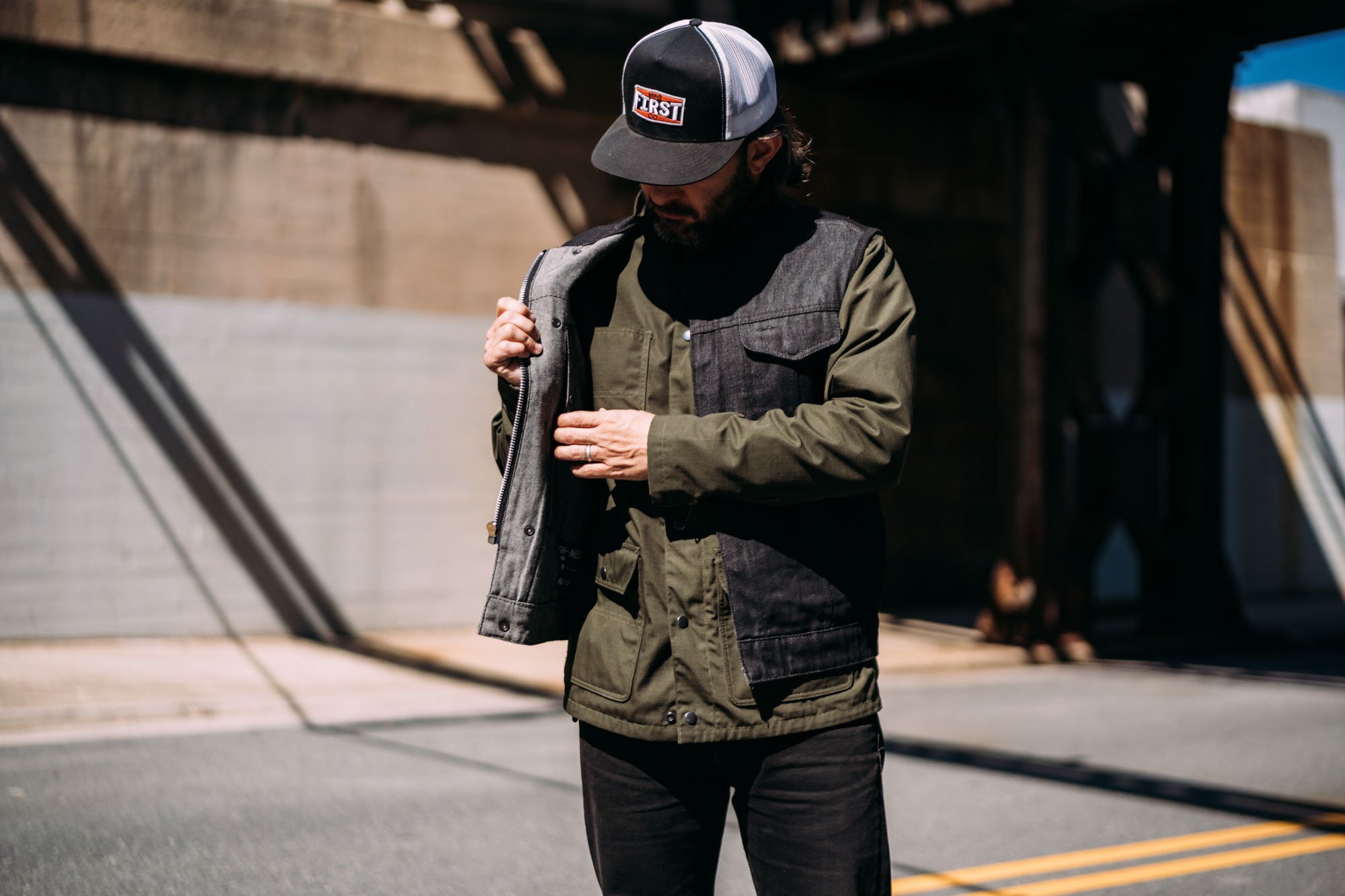 Haywood Black Denim Men's Motorcycle Vest featuring rough neck denim, multiple pockets, and a stylish design.