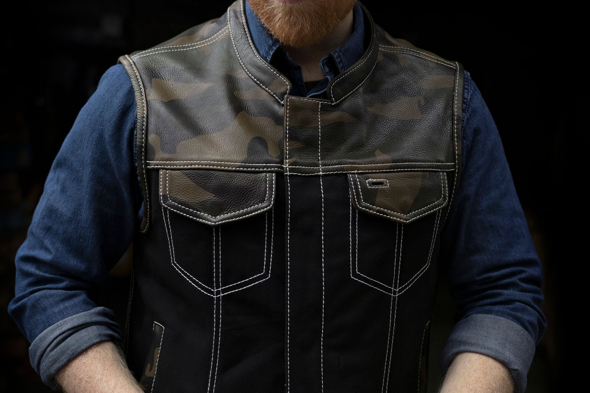 Infantry Men's Motorcycle Leather/Canvas Vest featuring Woodland Camo leather accents and a stylish club design.