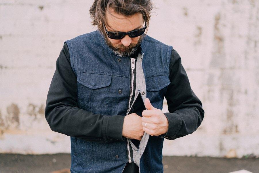 Kershaw Denim Motorcycle Vest in Blue, featuring a mandarin collar and multiple pockets for storage.