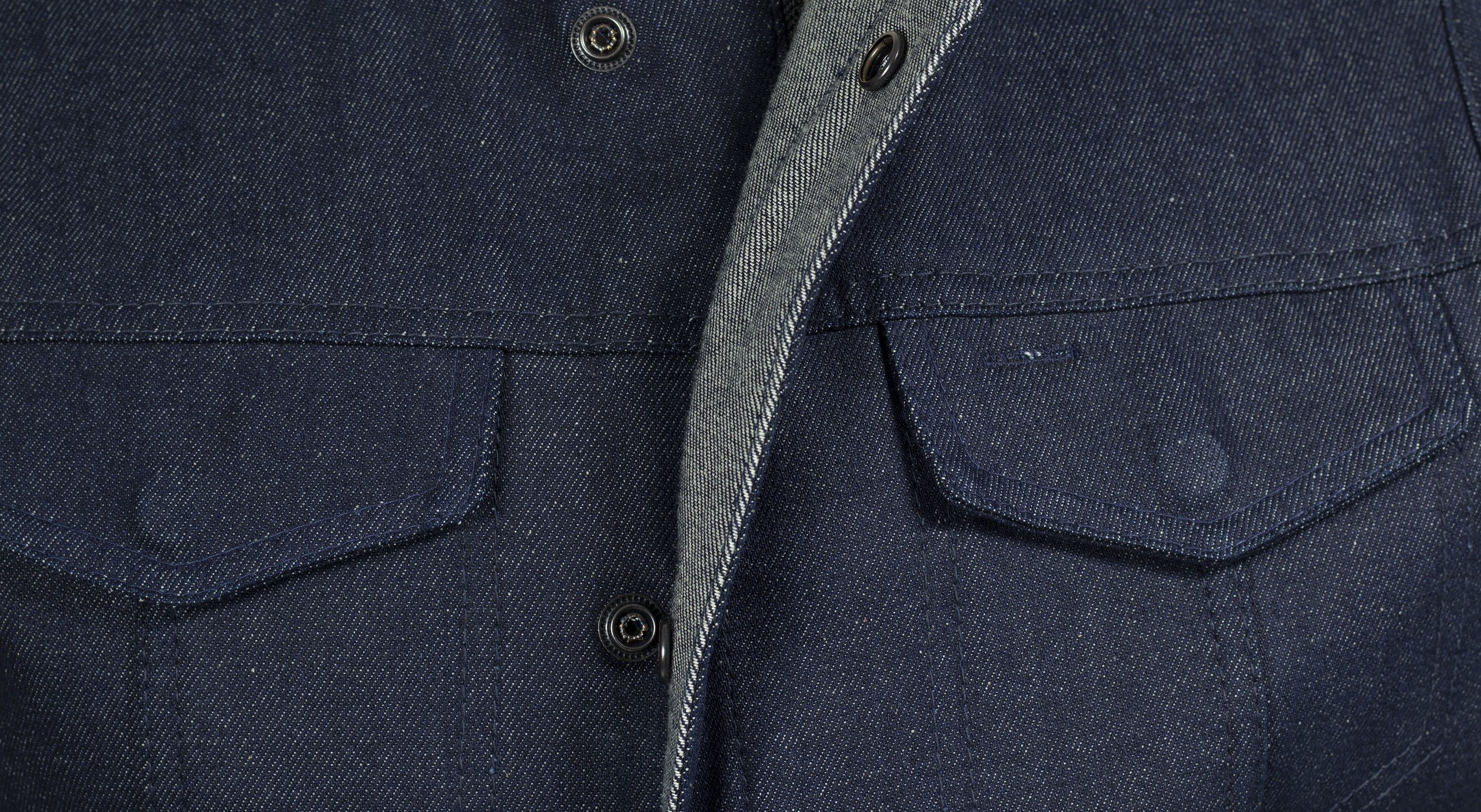 Kershaw Denim Motorcycle Vest in Blue, featuring a mandarin collar and multiple pockets for storage.