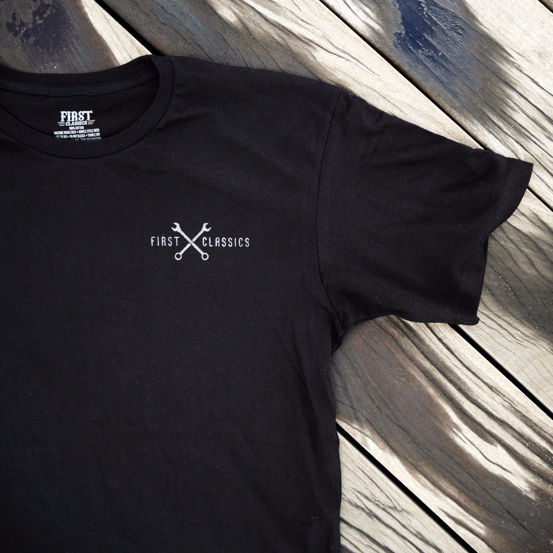 Live Free Reflective T-Shirt featuring a pocket-sized logo and reflective ink for night visibility.