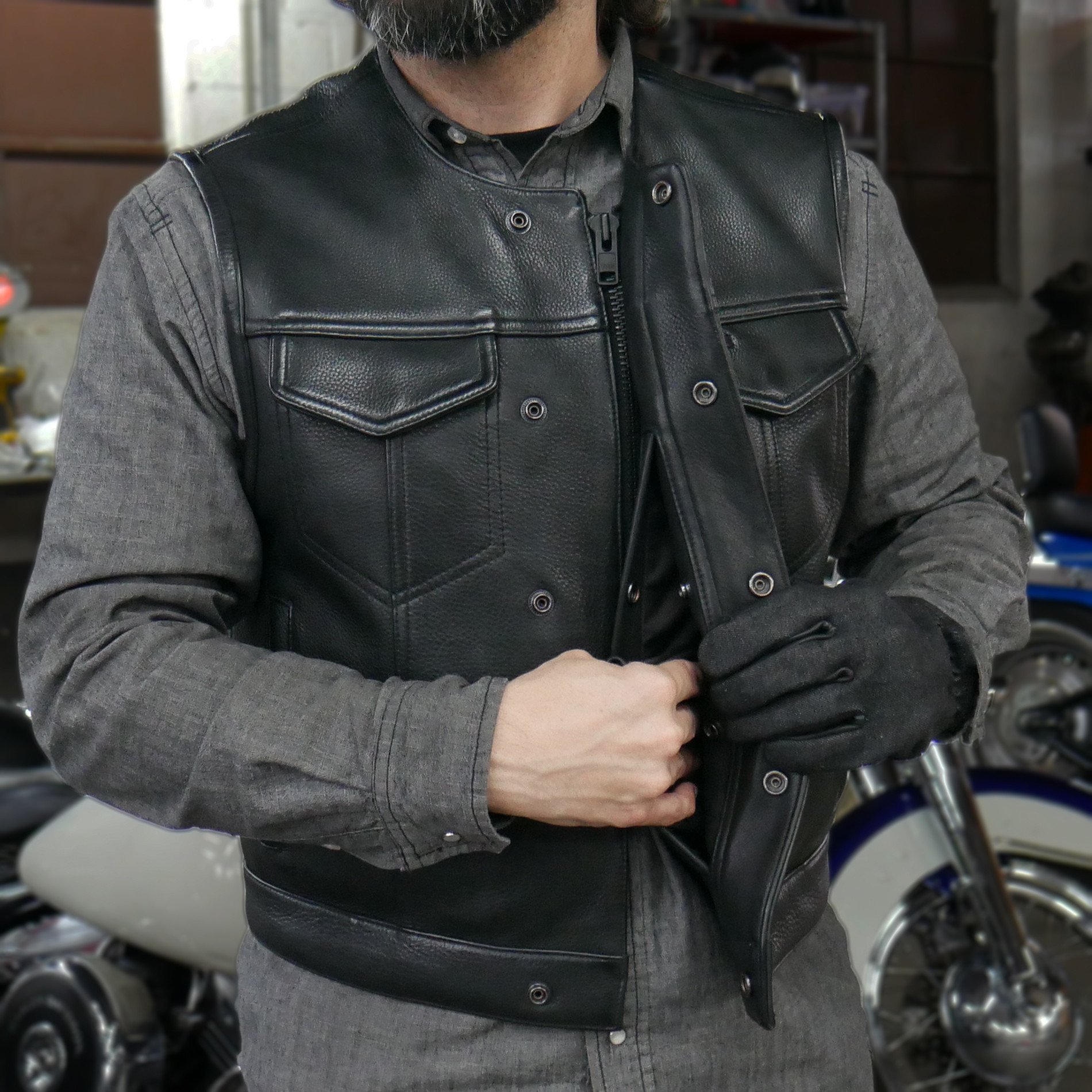 Lowside Men's Leather Motorcycle Vest made from premium cowhide, featuring concealed carry pockets and stylish design.