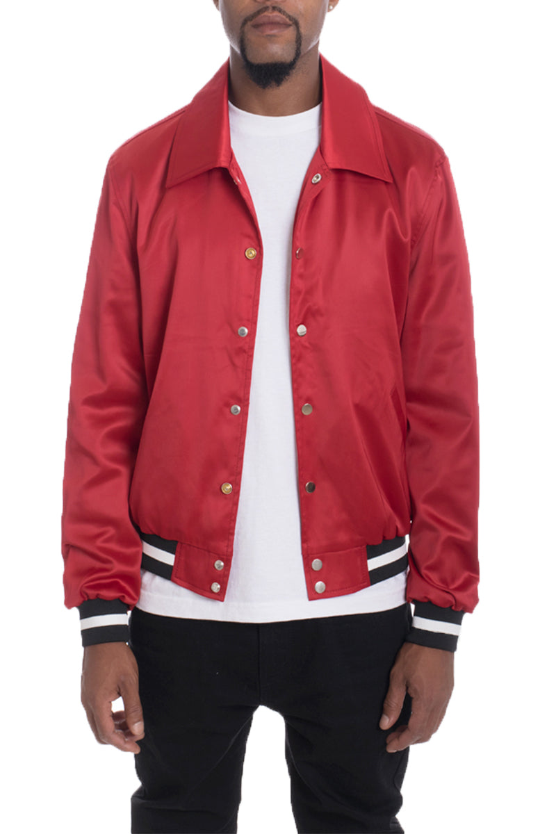 A stylish Luxe Satin Bomber jacket in a rich color, featuring a snap button closure and a single inner chest pocket, displayed on a mannequin.