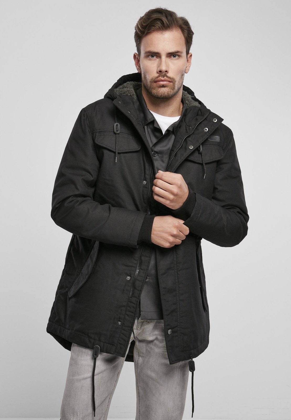 Marsh Lake Parka Jacket featuring a fishtail design, quilted lining, and leather applications, perfect for winter wear.