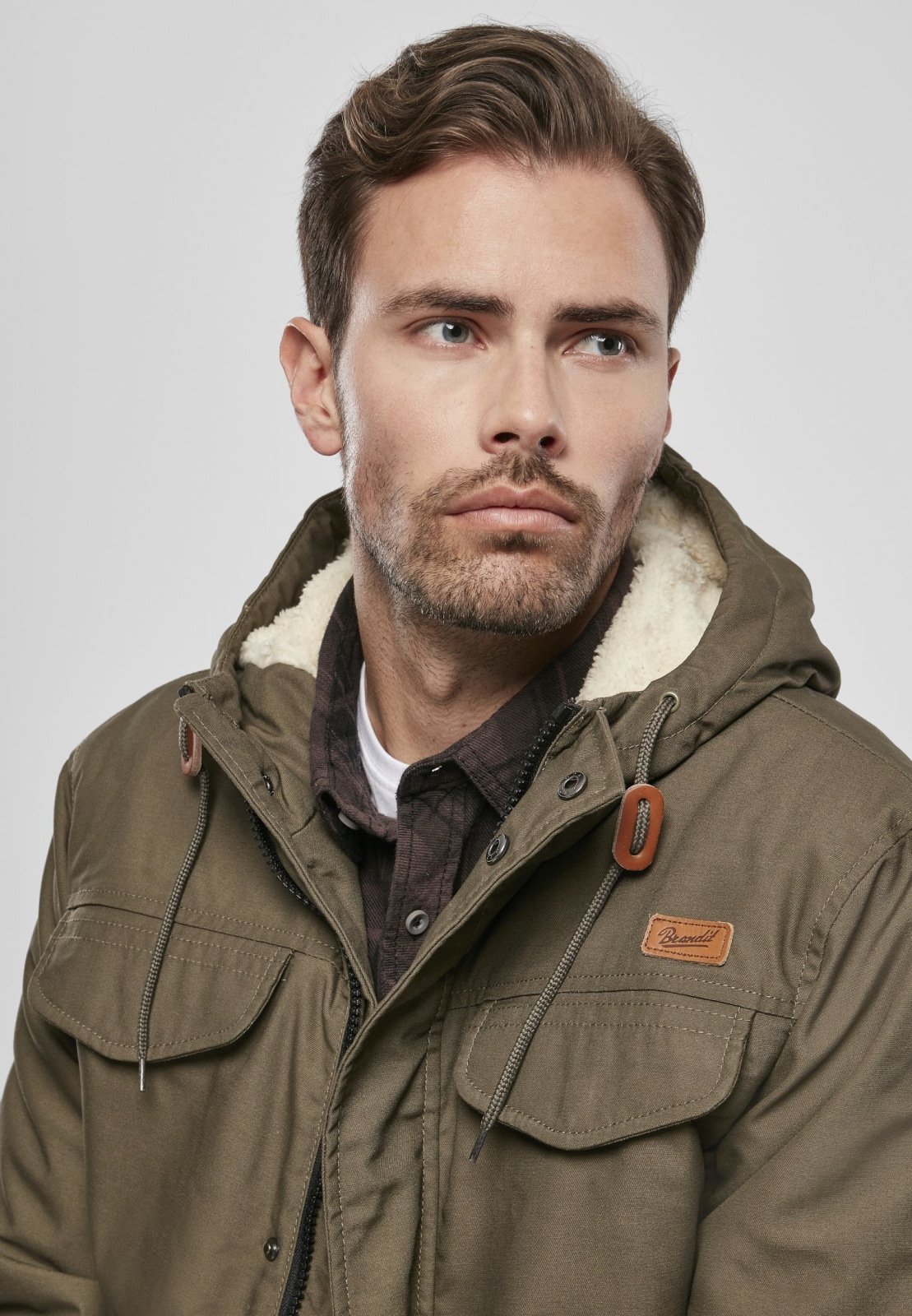 Marsh Lake Parka Jacket featuring a fishtail design, quilted lining, and leather applications, perfect for winter wear.