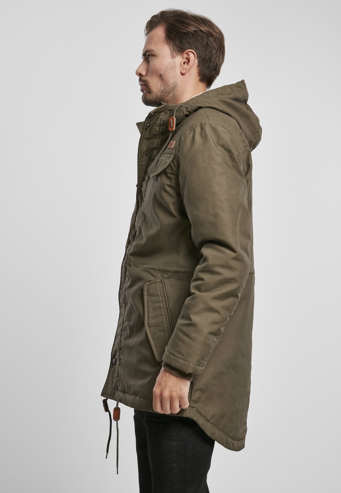 Marsh Lake Parka Jacket featuring a fishtail design, quilted lining, and leather applications, perfect for winter wear.