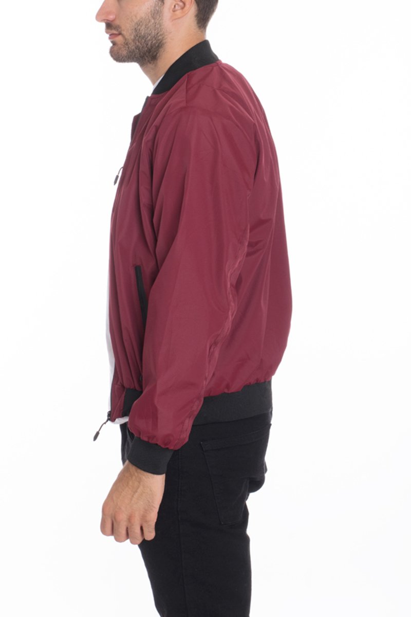 Men's Vinyl Waterproof Windbreaker in a stylish design, featuring a full zip front, ribbed cuffs, and multiple pockets, ideal for outdoor activities.