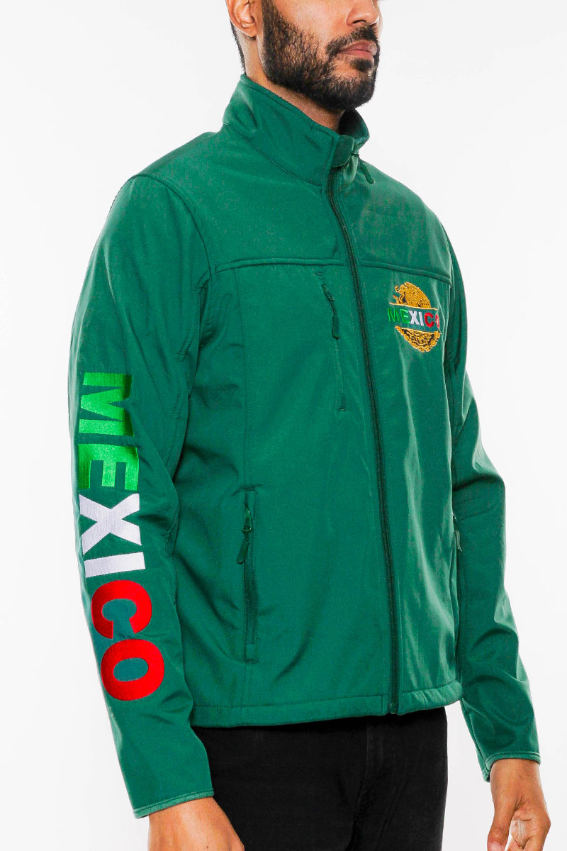 Mexico Embroidered Soft Shell Jacket featuring American flag graphic, chest logo, and fleece interior, perfect for stylish warmth.