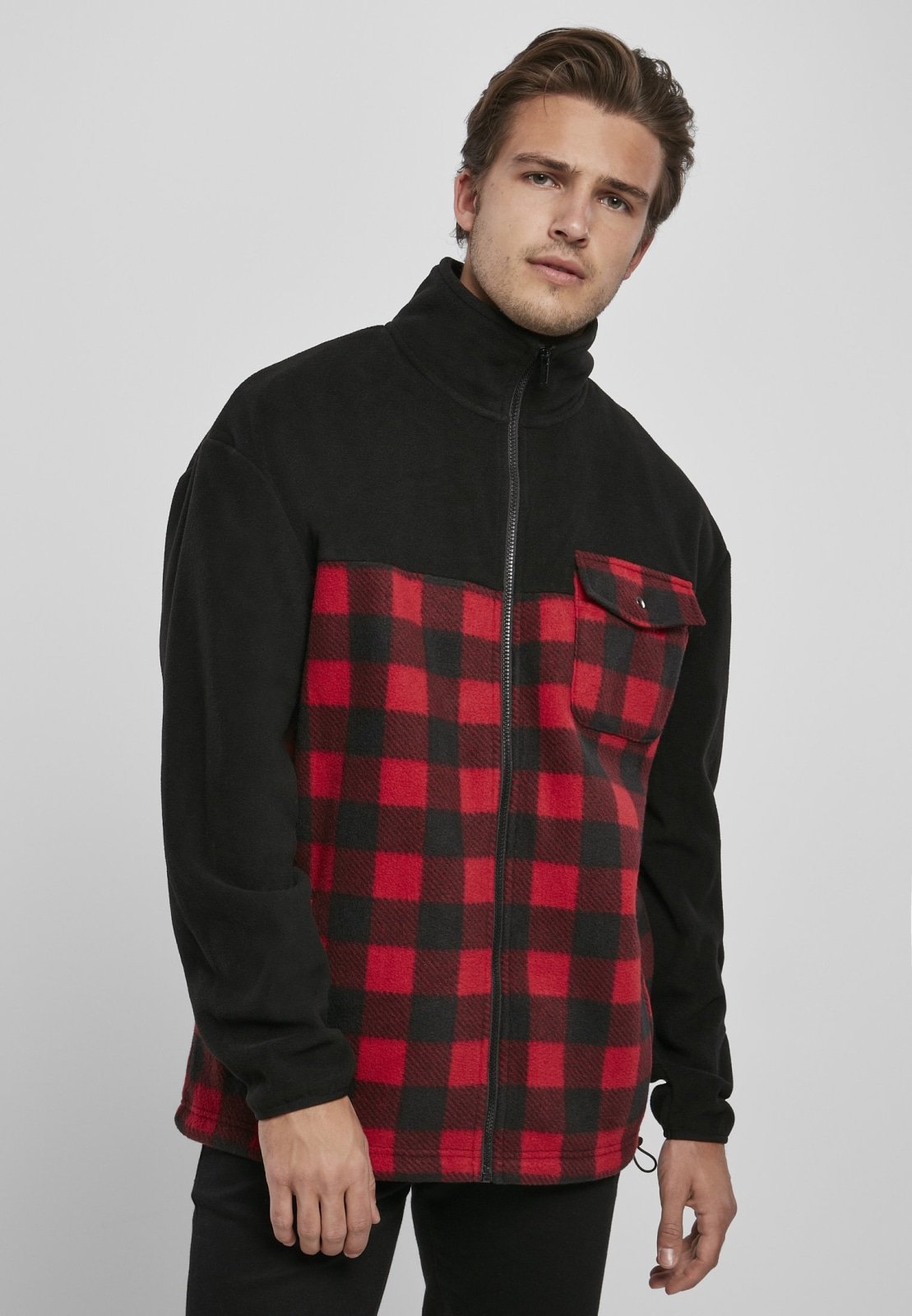 Men's Patterned Polar Fleece Track Jacket featuring a black top and plaid bottom, zip fastener, and practical pockets.