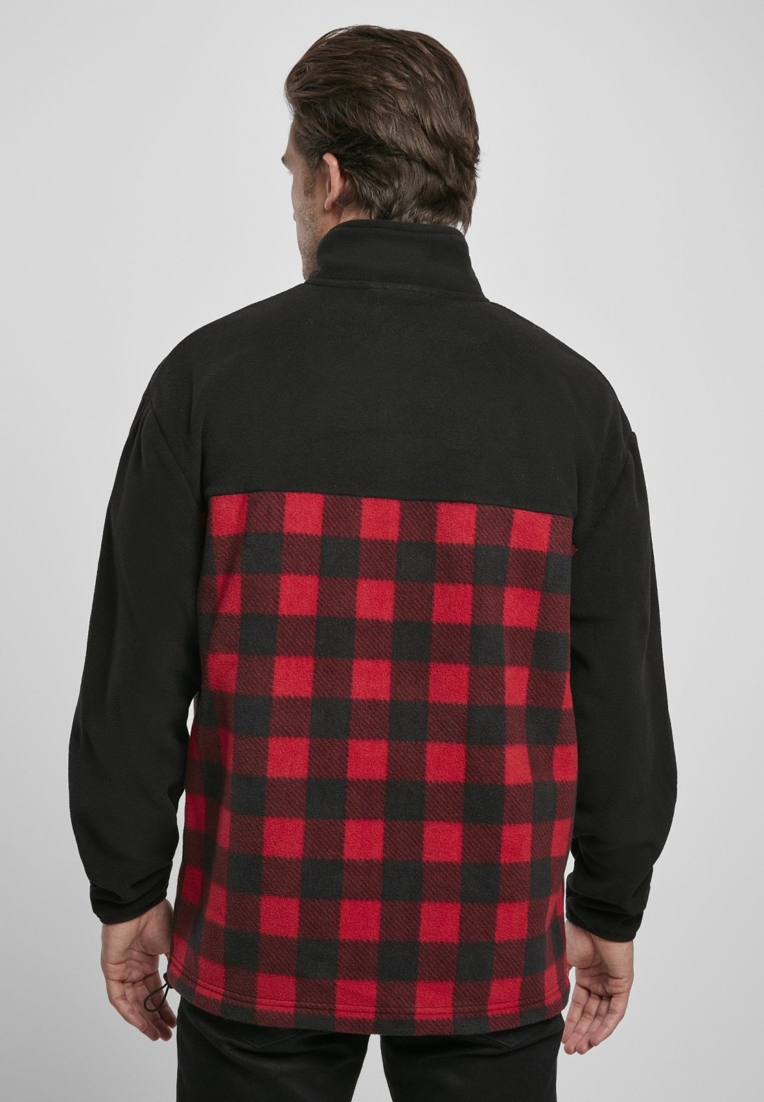 Men's Patterned Polar Fleece Track Jacket featuring a black top and plaid bottom, zip fastener, and practical pockets.