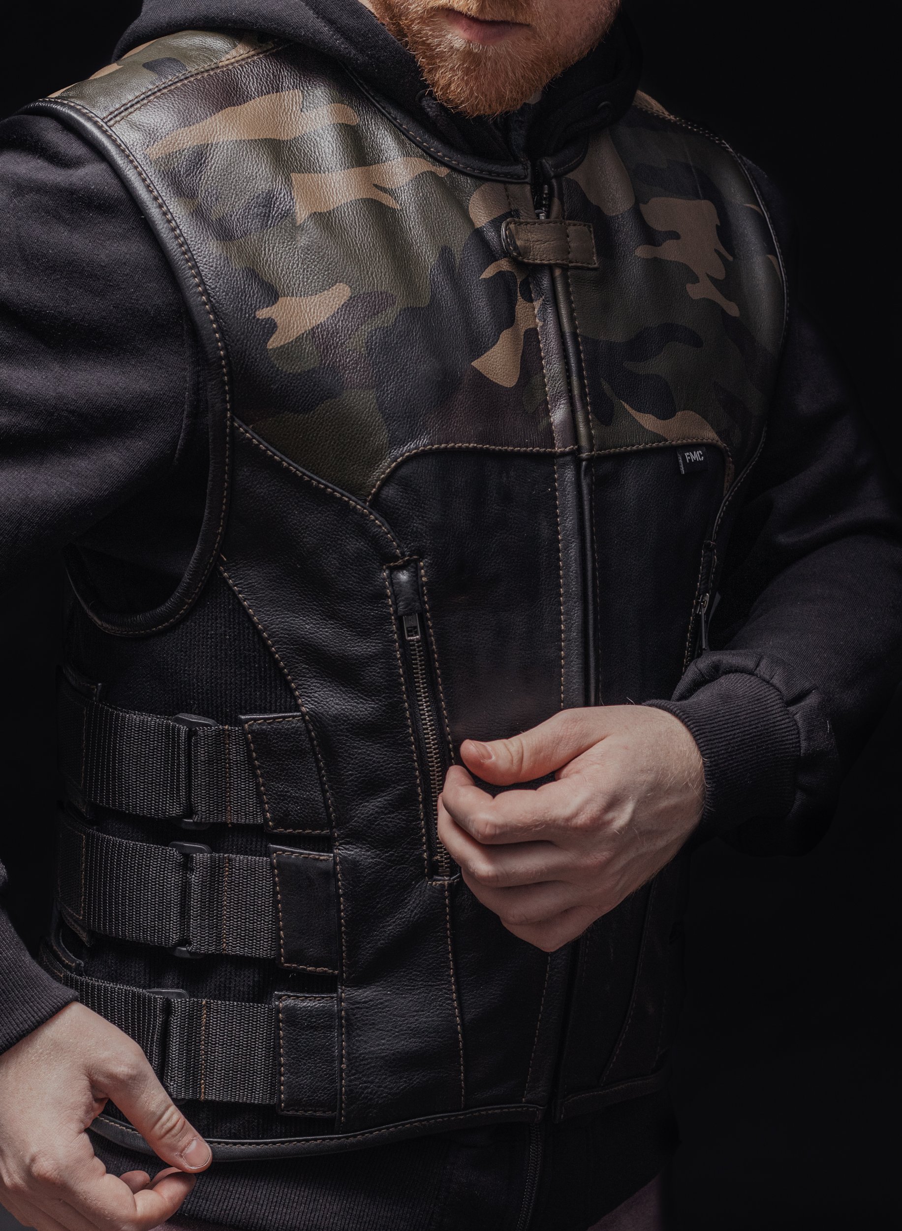 Limited edition Predator men's leather vest in woodland camo and black leather with SWAT style design.