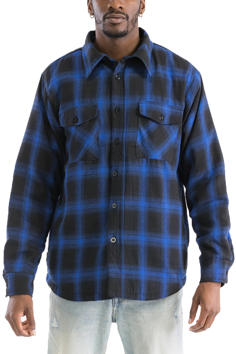 A stylish Quilted Flannel Shirt featuring a button closure, quilted polyester lining, and standard side pockets, perfect for layering.