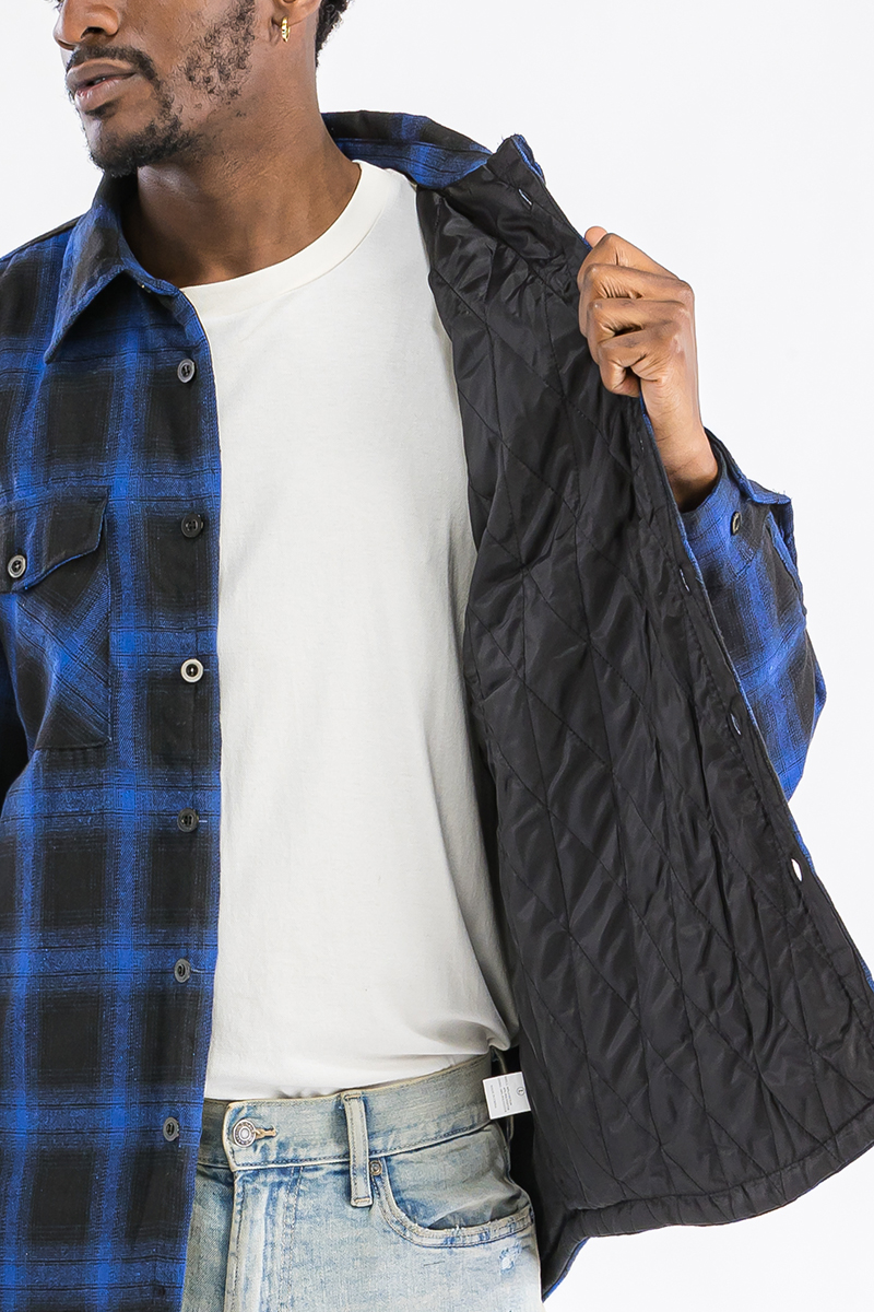 A stylish Quilted Flannel Shirt featuring a button closure, quilted polyester lining, and standard side pockets, perfect for layering.