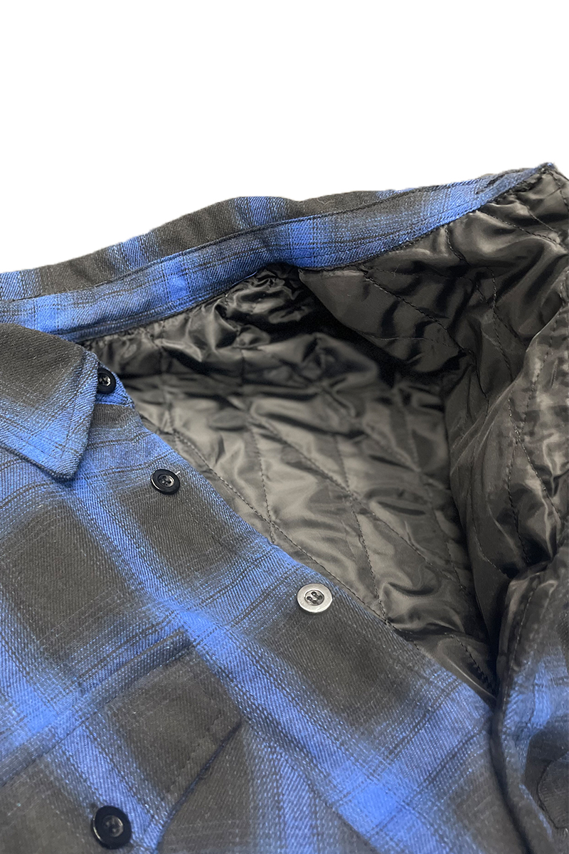 A stylish Quilted Flannel Shirt featuring a button closure, quilted polyester lining, and standard side pockets, perfect for layering.