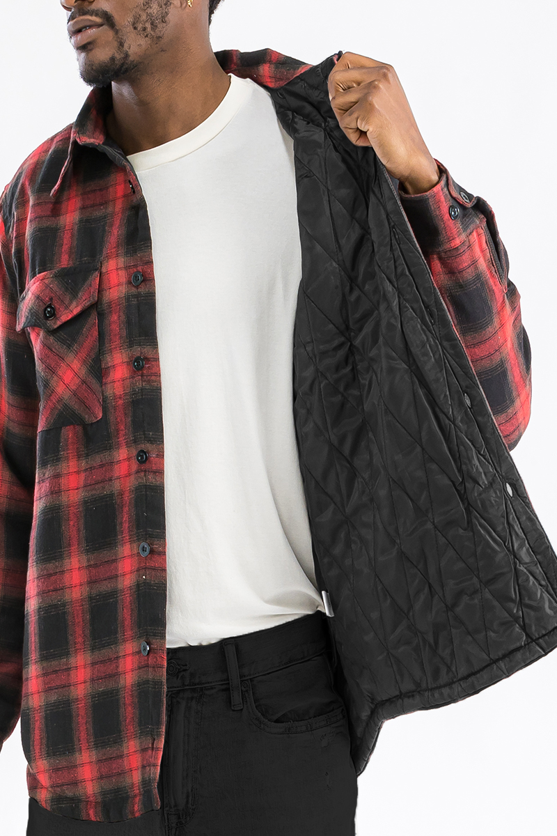 A stylish quilted flannel shirt featuring a button closure, cozy polyester lining, and standard side pockets, perfect for casual wear.