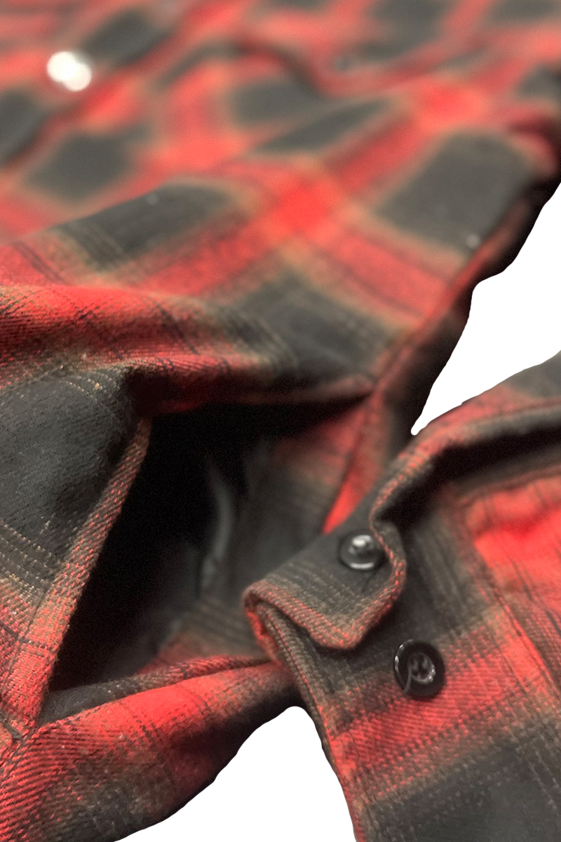 A stylish quilted flannel shirt featuring a button closure, cozy polyester lining, and standard side pockets, perfect for casual wear.