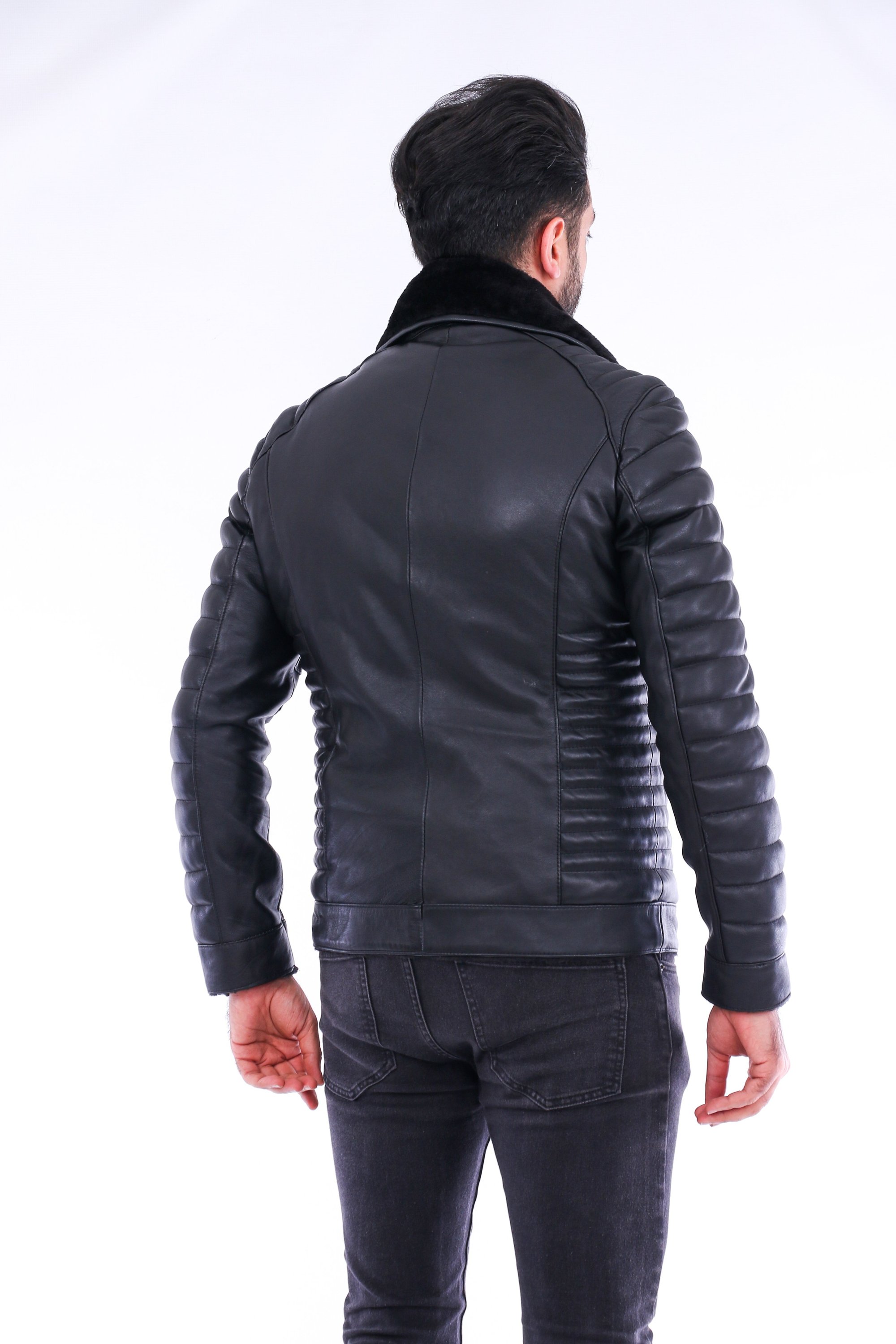 Rocca Leather Jacket made from premium lambskin leather, featuring a detachable faux fur collar and polished silver-tone hardware.