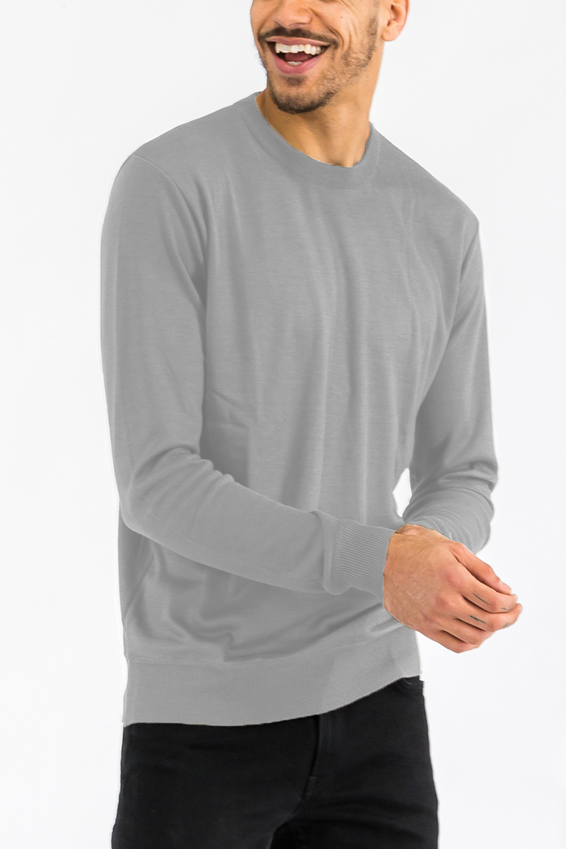 A stylish round neck knit sweater in a soft fabric, showcasing its regular fit and pull-over design.