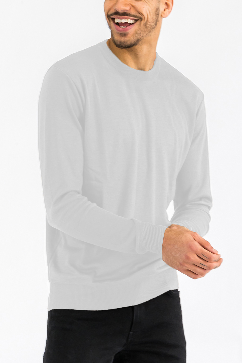 A stylish round neck knit sweater in a soft fabric, showcasing a classic design perfect for casual and layered outfits.