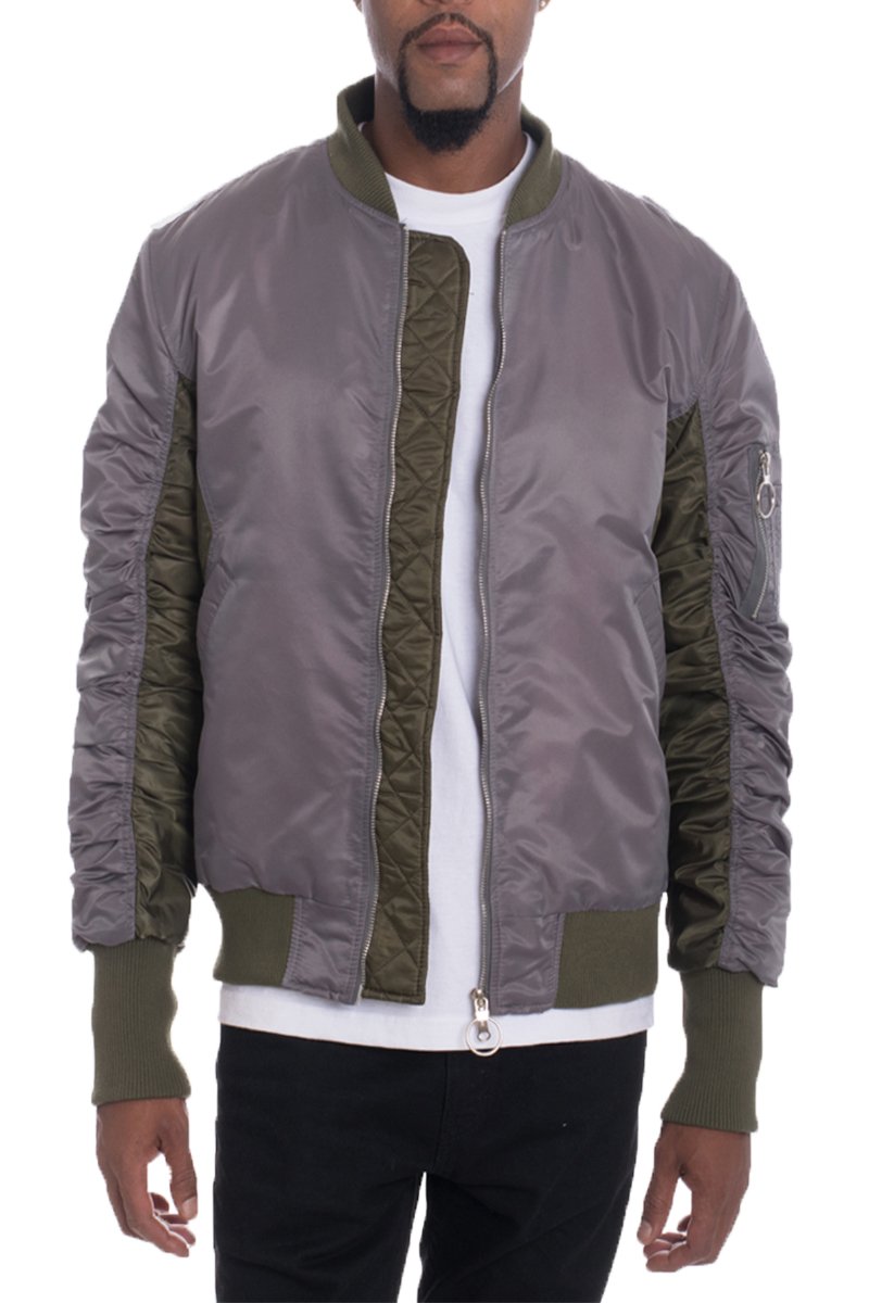 A stylish Two Tone Bomber jacket featuring scrunched sleeves, pockets, and a modern design, perfect for casual and trendy outfits.