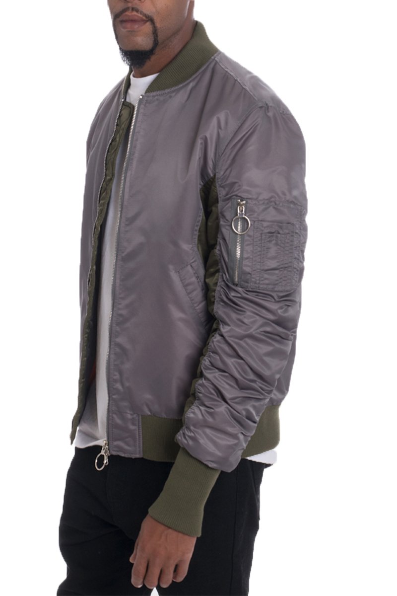 A stylish Two Tone Bomber jacket featuring scrunched sleeves, pockets, and a modern design, perfect for casual and trendy outfits.