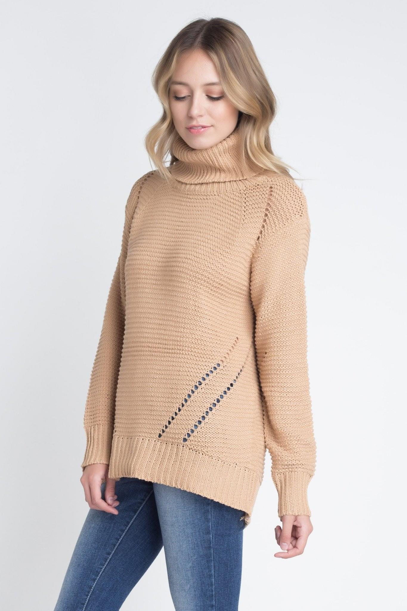 A stylish Women's Loose Fit Hi-Low Turtleneck Sweater in a cozy knit fabric, featuring a turtleneck and a trendy hi-low hem.