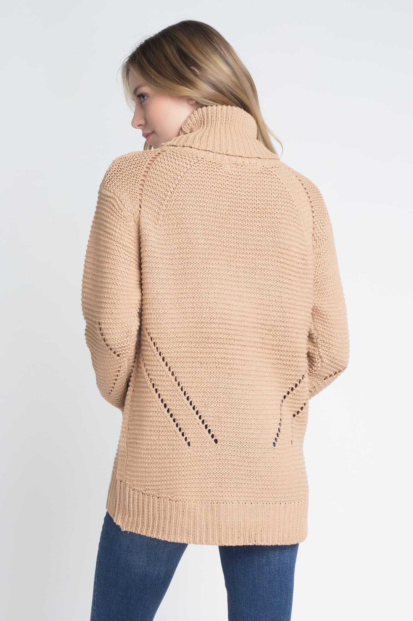 A stylish Women's Loose Fit Hi-Low Turtleneck Sweater in a cozy knit fabric, featuring a turtleneck and a trendy hi-low hem.