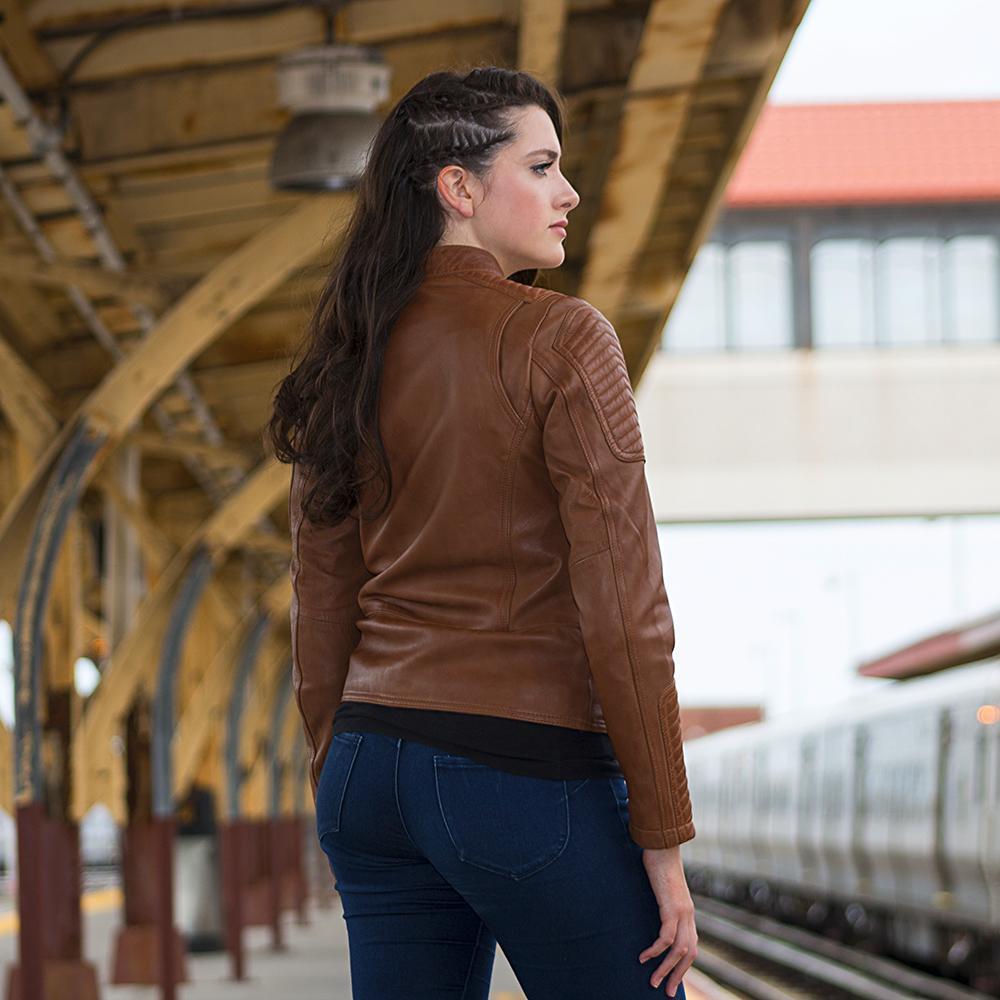 Zena Women's Leather Jacket featuring chevron quilting, off-center zip, and multiple pockets in black color.