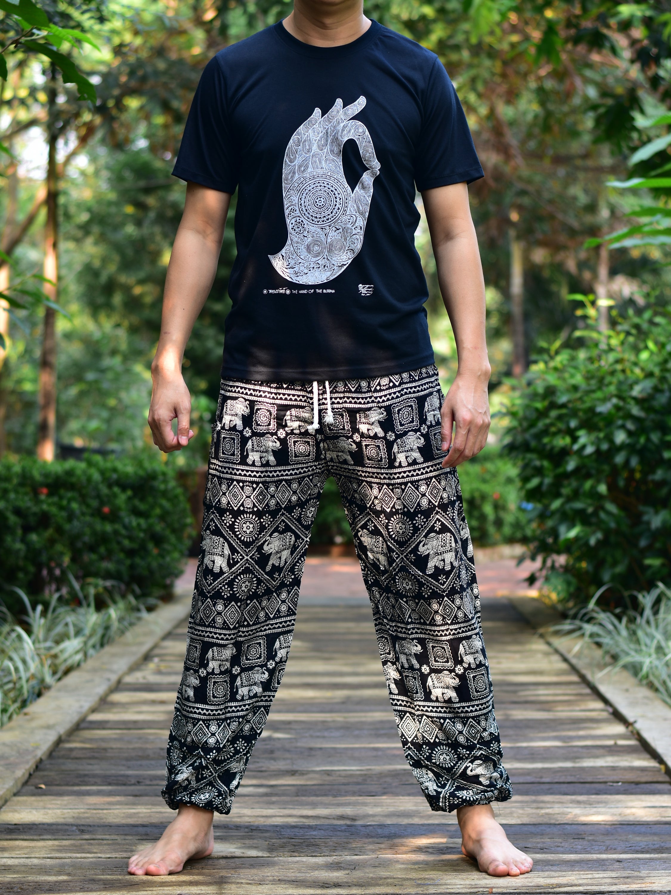 Bohotusk Men's Black Elephant Print Harem Pants featuring a drawstring waist and elasticated ankles, made from soft rayon fabric.