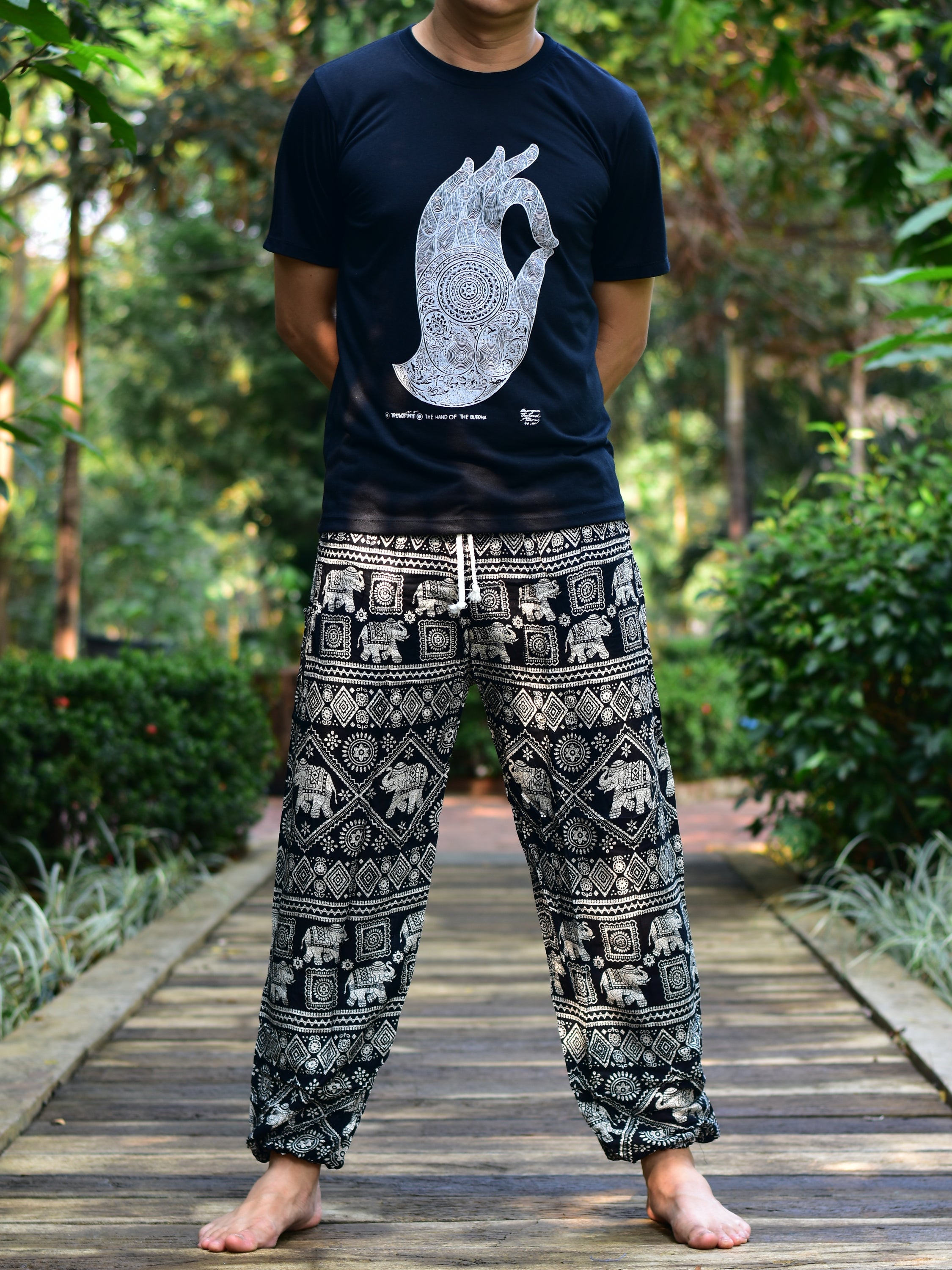 Bohotusk Men's Black Elephant Print Harem Pants featuring a drawstring waist and elasticated ankles, made from soft rayon fabric.